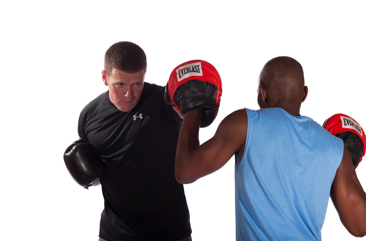 michael-flanagan-40-below-fitness-boxing-with-personal-fitness-client-male-close-up-web.jpg