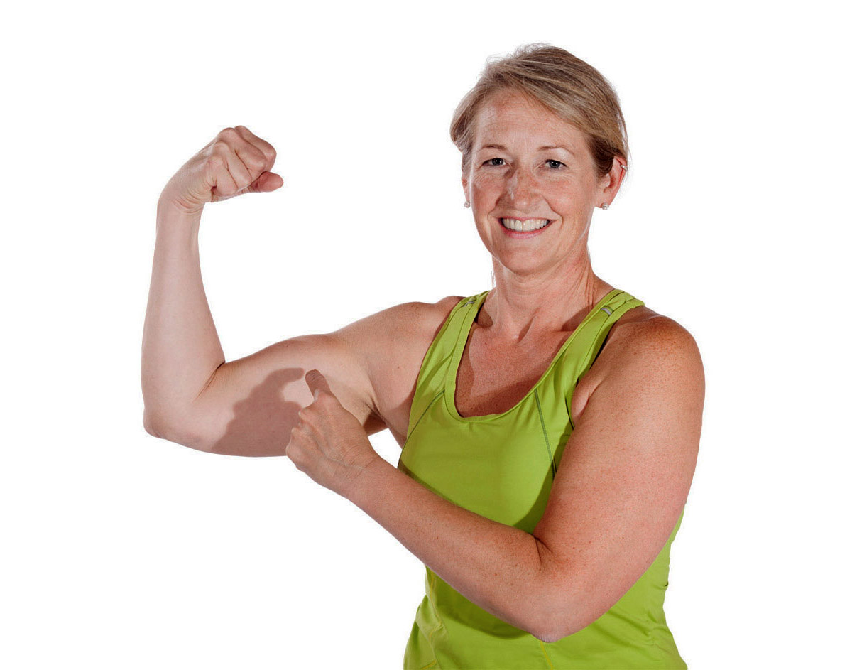 female-client-flexing-muscle-40-below-fitness-fairbanks-ak-web.jpg