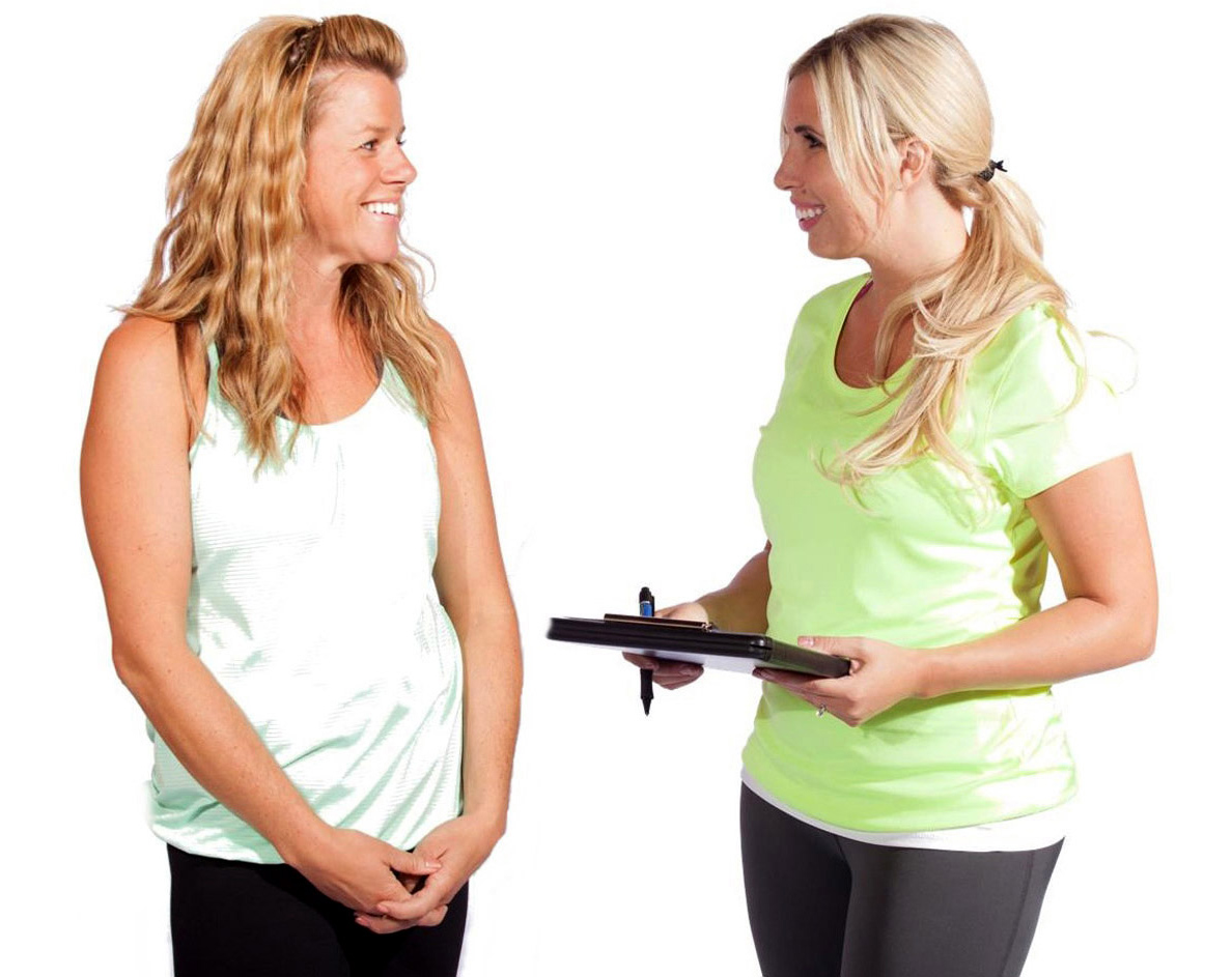 phoebe-flanagan-fitness-trainer-with-female-client-holding-clipboard-fairbanks-alaska-web-b.jpg