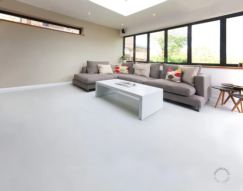 Bright, modern living space showcasing a PU Comfort Floor in light grey. Clean lines and a luxurious finish for our clients in North London. 
Residential Floors by Chasingspace, London
👉 www.chasingspace.co.uk 
Call 07799 673383 + 020 8265 2855
@