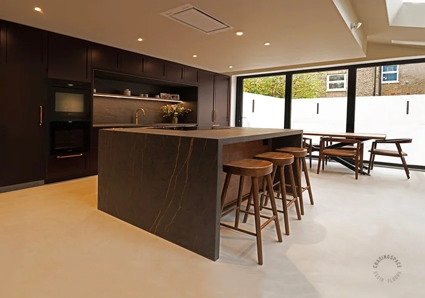 Elegant kitchen showcasing a durable and stylish Mistral Blend Resin Floor with a subtle two-tone design.

- Luxurious, comfortable and easy to maintain.

Thinking about resin flooring? Get in touch and we will do our best to help with all the inform