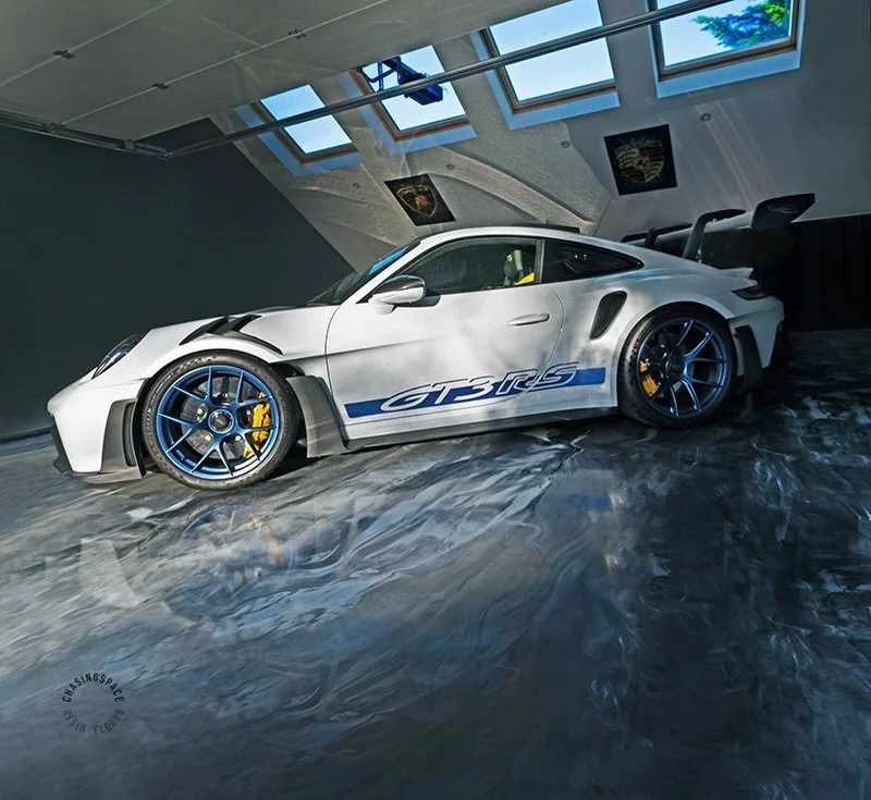 Porsche GT3 RS on a Chasingspace triple-tone Epoxy Floor with a high-gloss finish.

An epoxy floor can transform your garage into something truly unique.✨ 

Benefits of our epoxy flooring system: 

Customisation options - Tailor the look to your styl