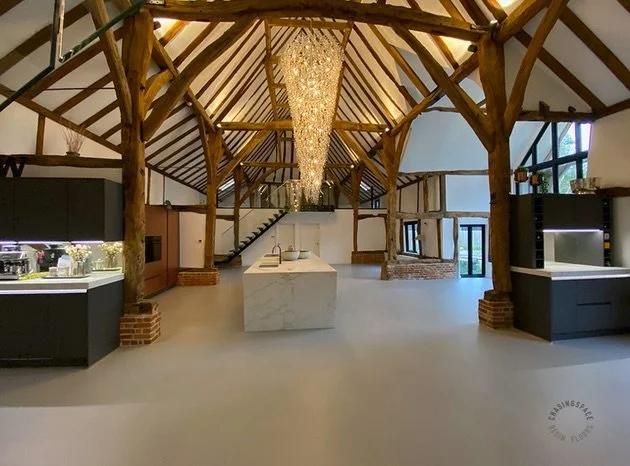 Historic barn in Hertfordshire features a stunning 165m2 PU Comfort Floor in mid grey colour.

Dating back to the time of Henry VIII, the barn beautifully combines history with contemporary design, with a layout that is both welcoming and functional.