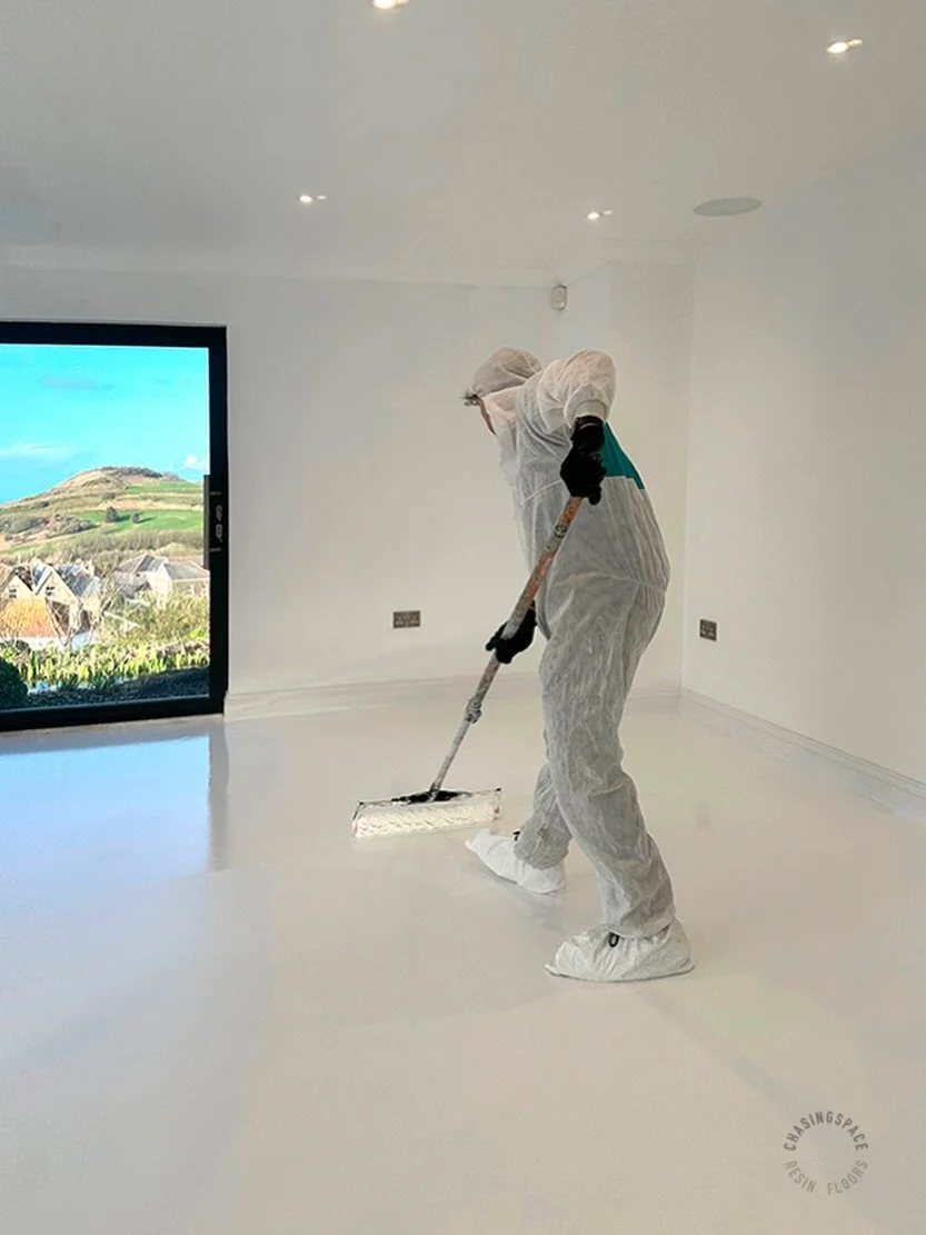 Suiting up for the perfect result.

Hard at work applying the final clear seal coats to ensure the floor is protected and looks absolutely stunning.💎

Transform your space with our bespoke resin floors.
Custom colours - luxurious finish - versatile 