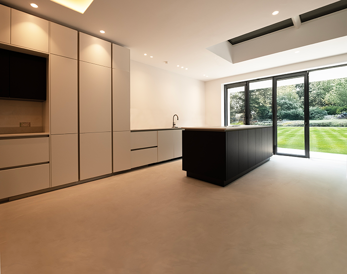 Modern kitchen, featuring a two-colour blend resin floor.