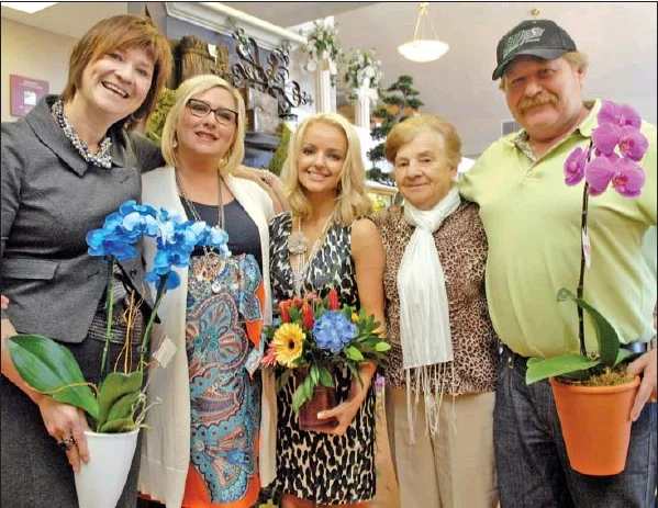 Wascana Flower Shoppe is staffed by family. Shown here are Petra Janssen (left), Tanya Anderson (Janssen Class of 2000) , Laurissa Janssen, Erika Wefel and Ewald Janssen. Picture Courtesy Don Healy – Regina Leader Post