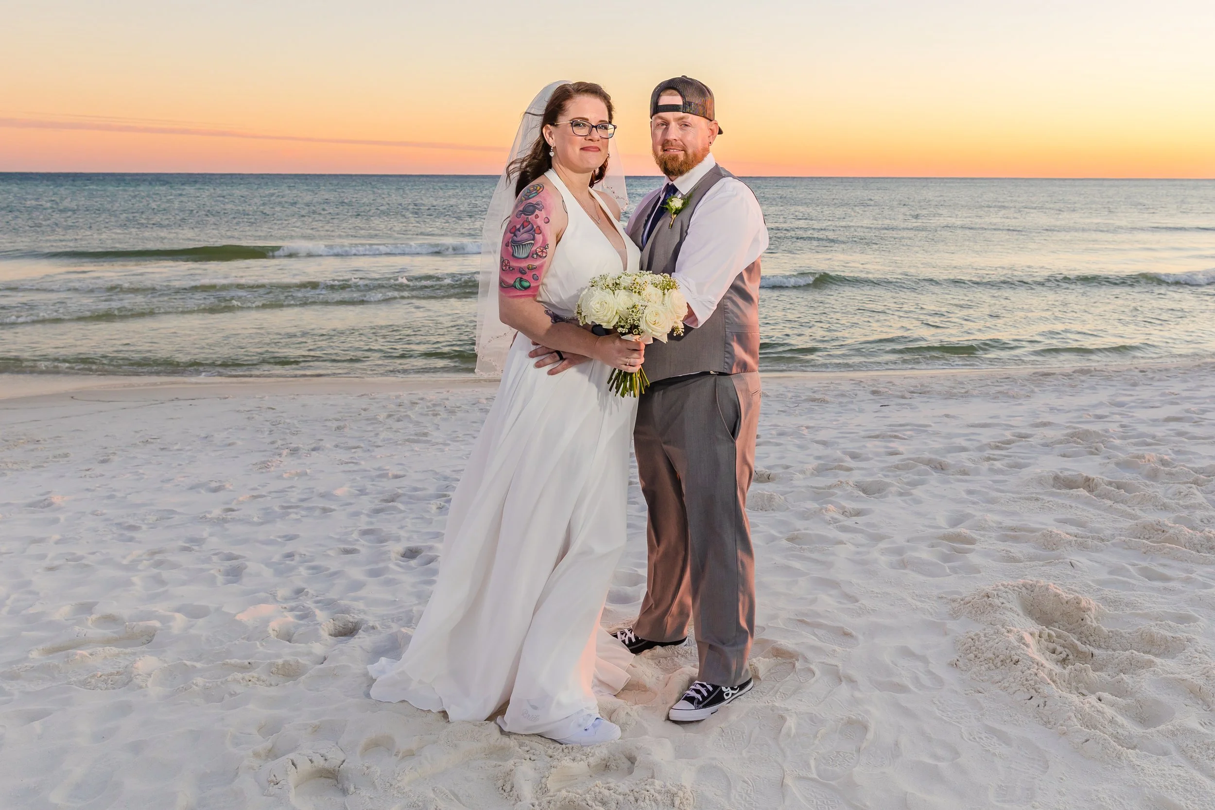 bride and groom Sunset portraits on Fort Walton Beach Florida white sandy Beach Picture taken by a Jacksonville and St. Augustine Florida Photographer