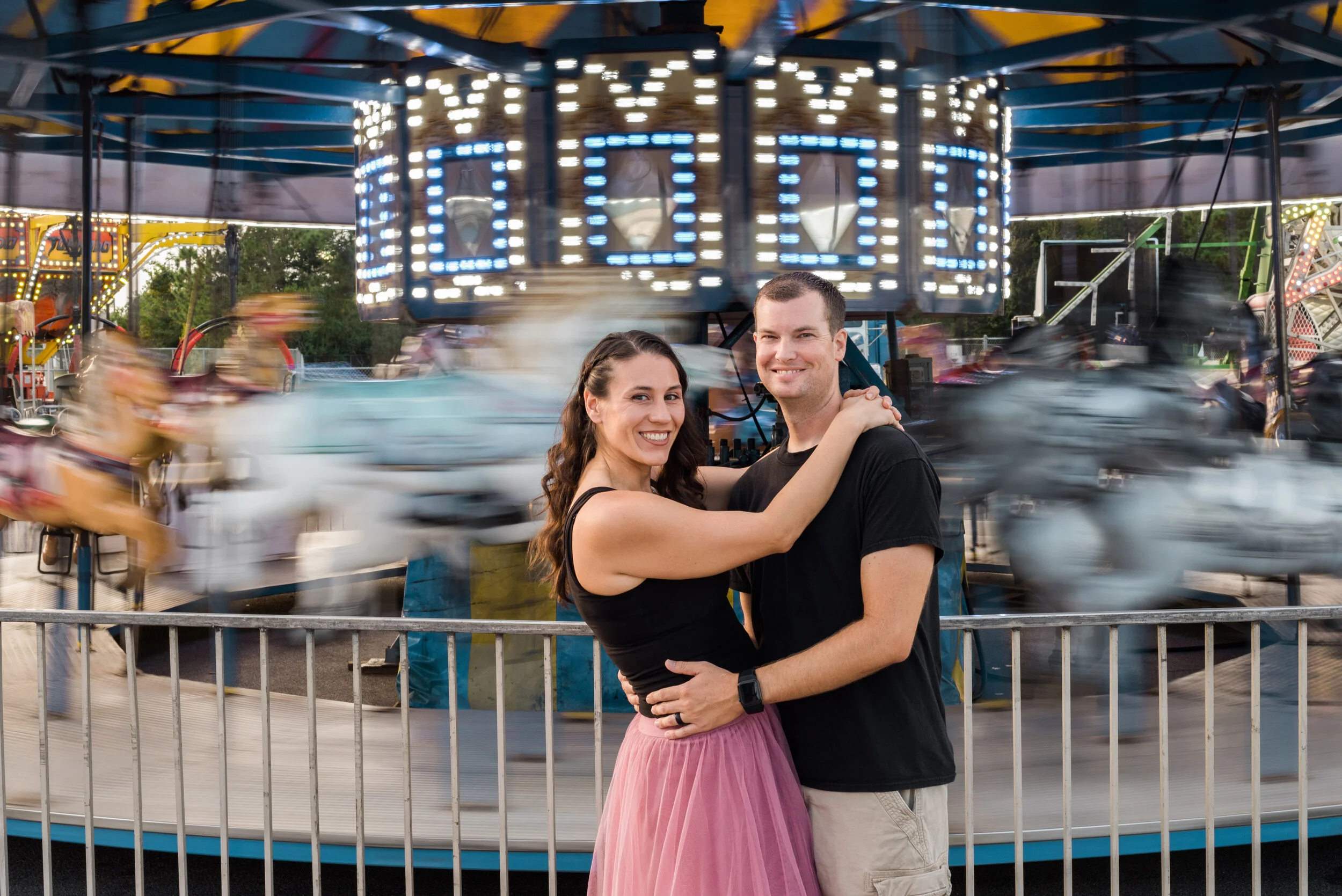 Christy of Inspired By You Photography with her husband, a local photographer serving Navarre Beach and Florida's Gulf Coast.