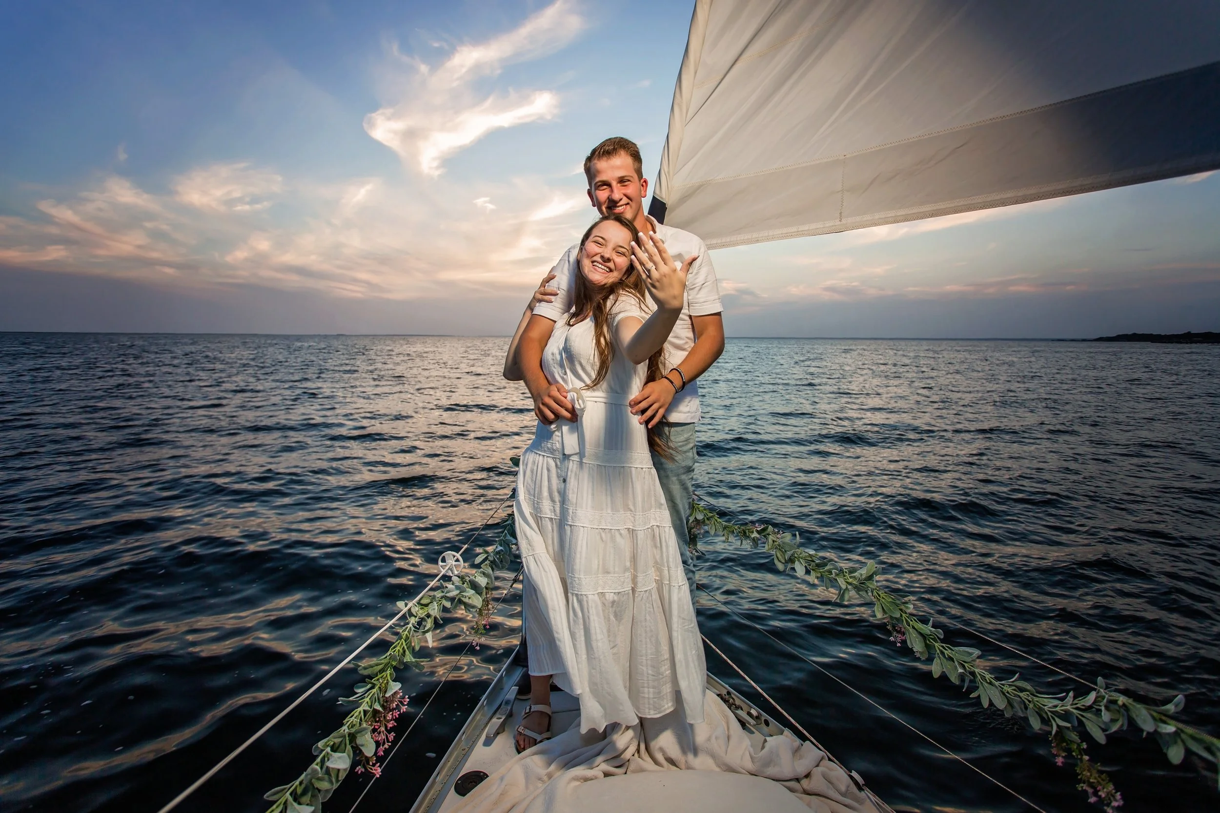 Open ocen engagement pictures taken on a boat off the Jacksonville beach coast