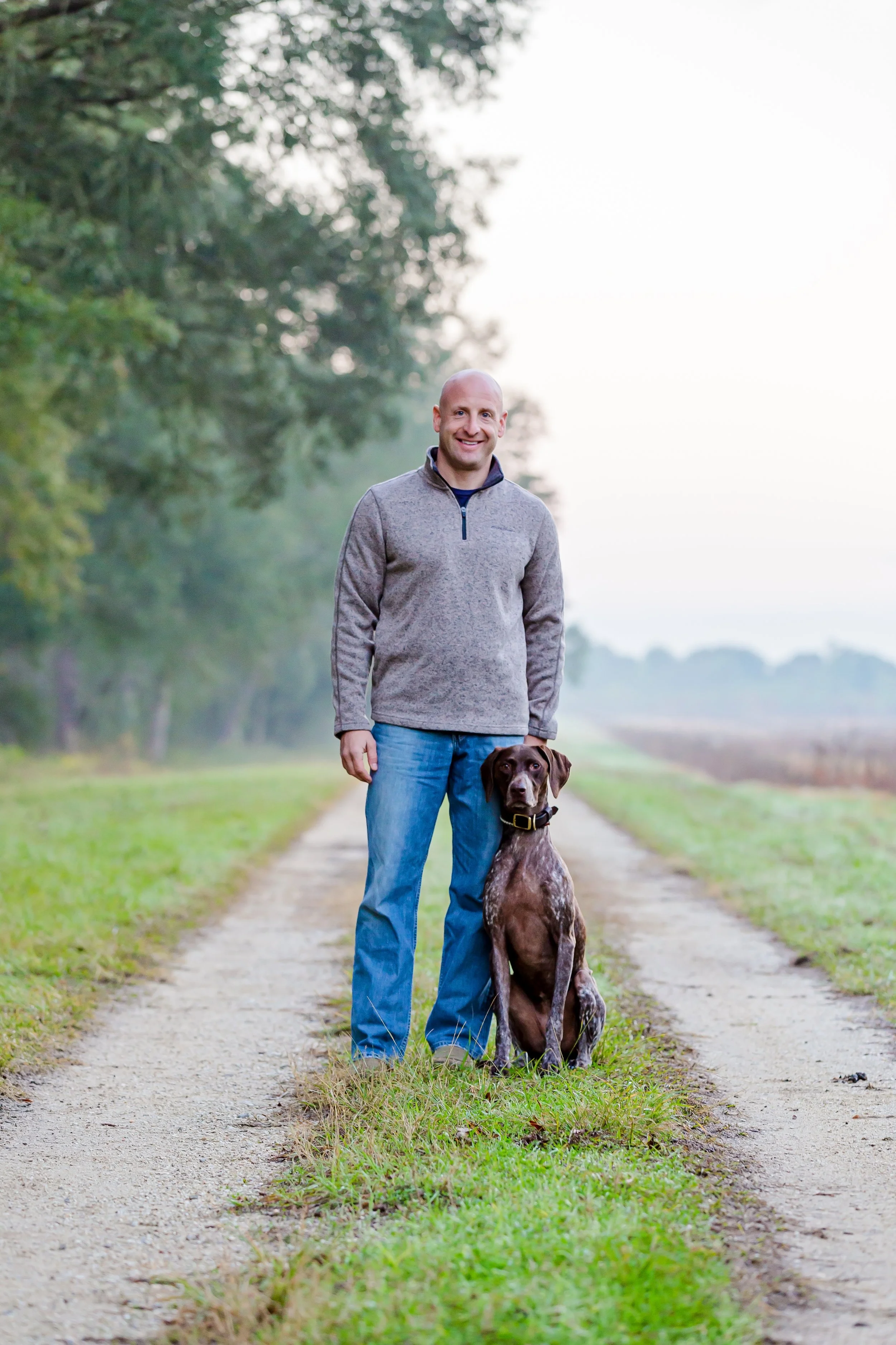Jacksonville man and hi dog posing for a picture