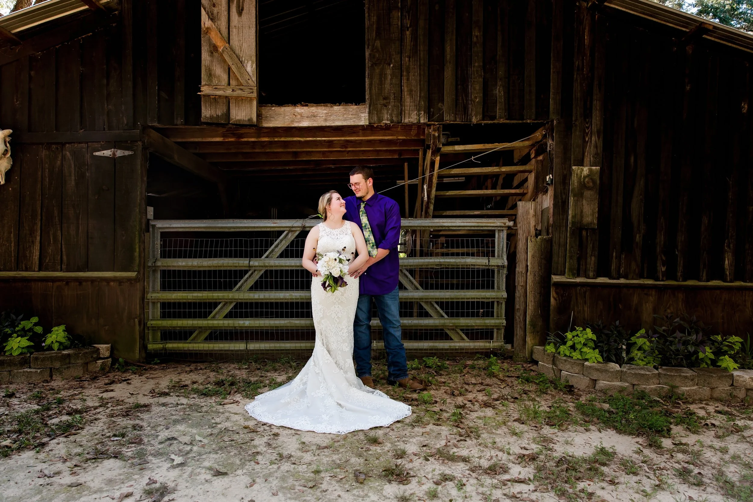 Bride and Groom country wedding barn portraits taken by a Jacksonville beach and St. Augustine photographer