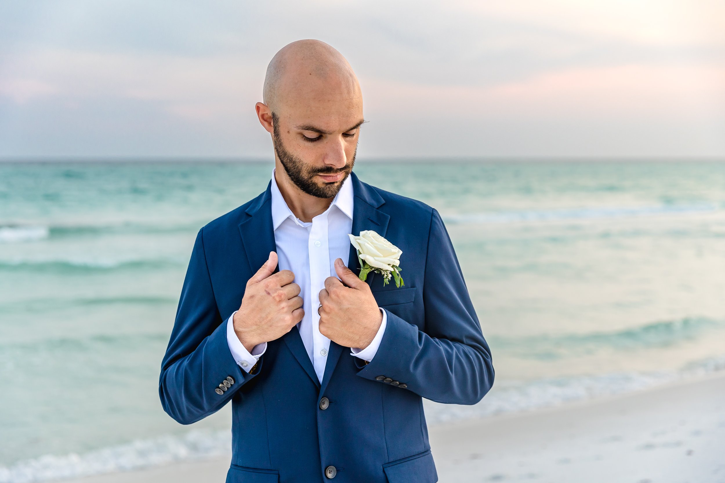 Groom standing on Henderson Beach image taken by Jacksonville Florida Wedding photographer