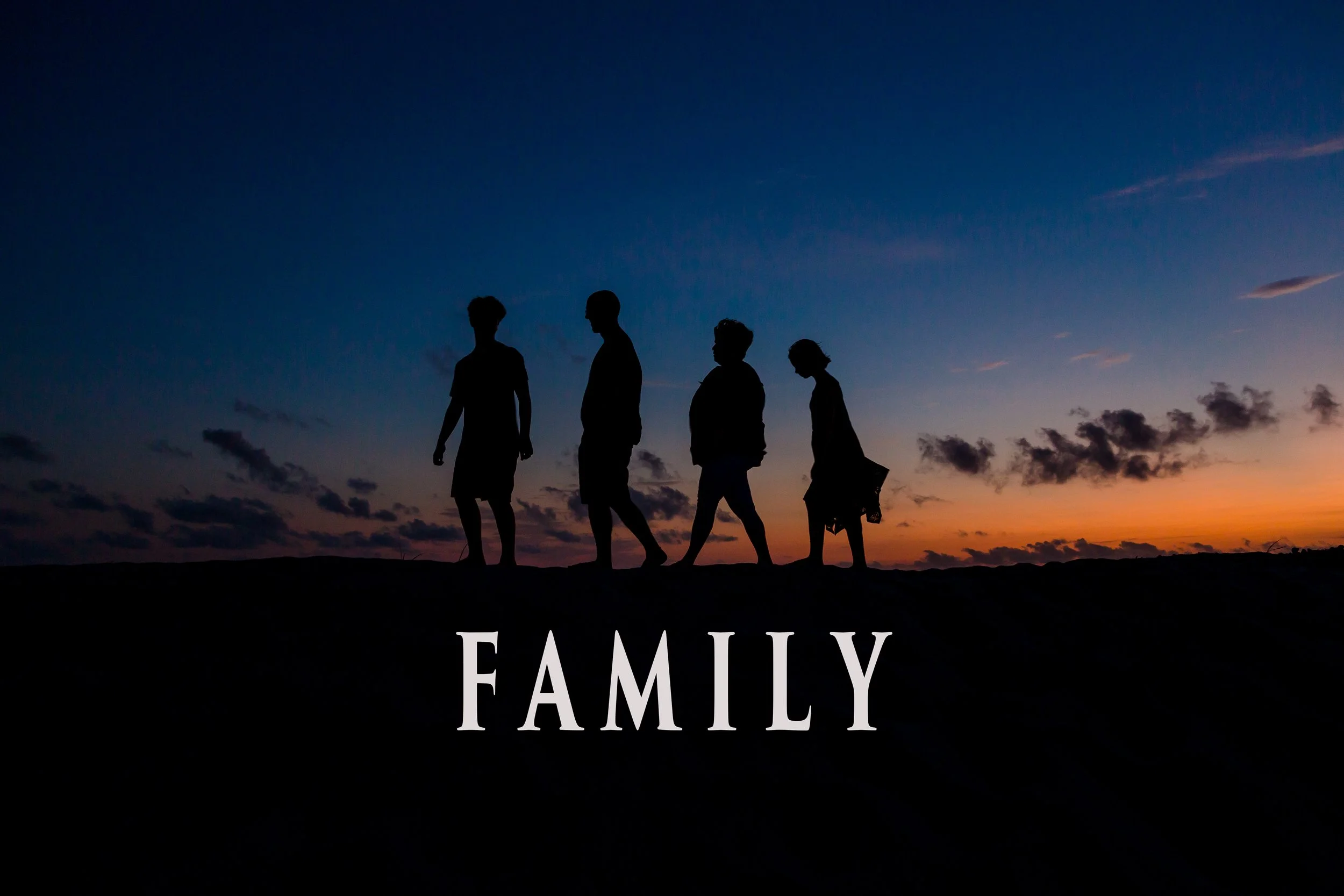 A picture of a Jacksonville Florida family walking infant of a colorful sky