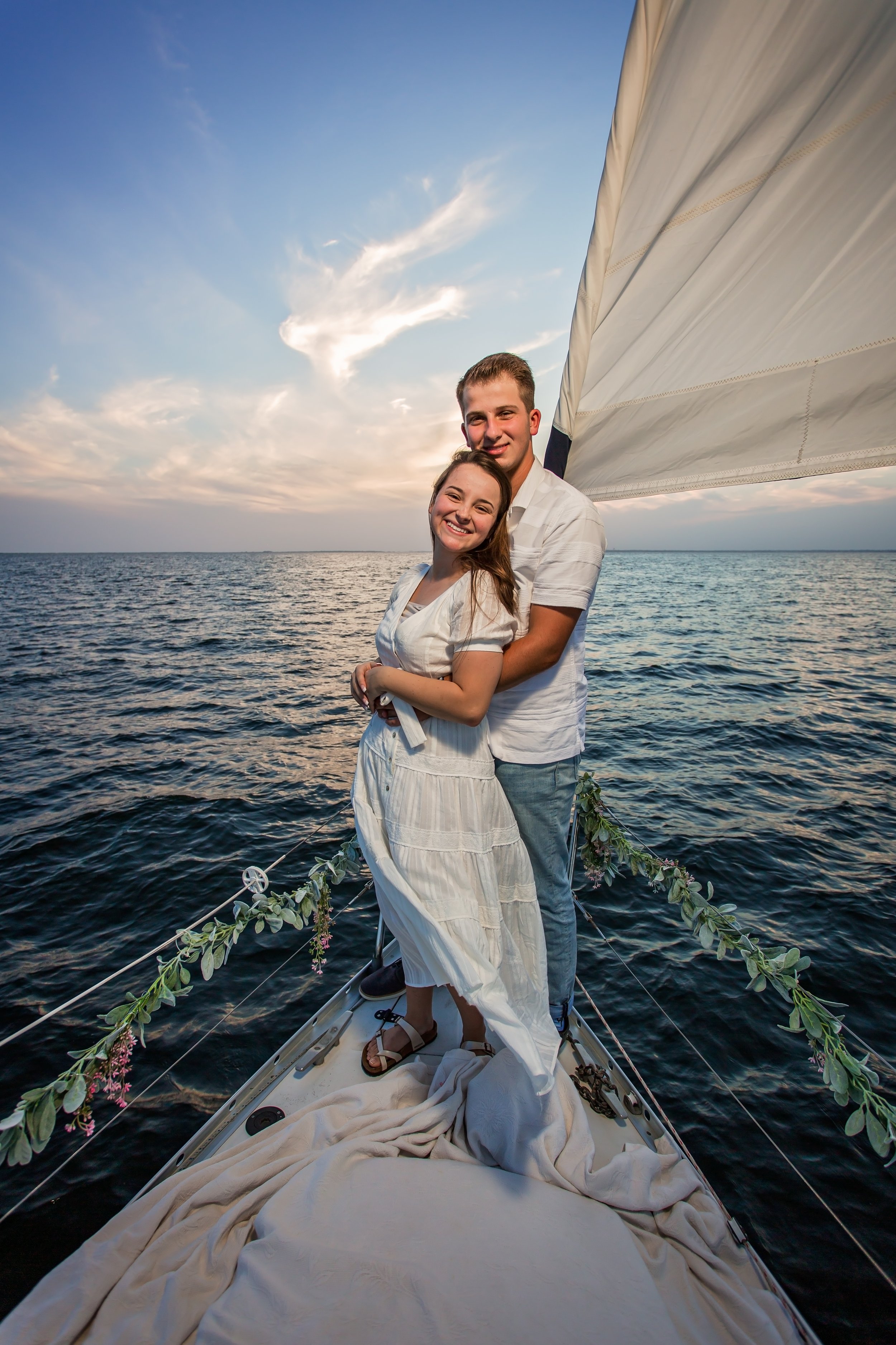 Engagement  pictures on Adventure Sailing Tours boat in Pensacola Florida by a Jacksonville Beach Photographer