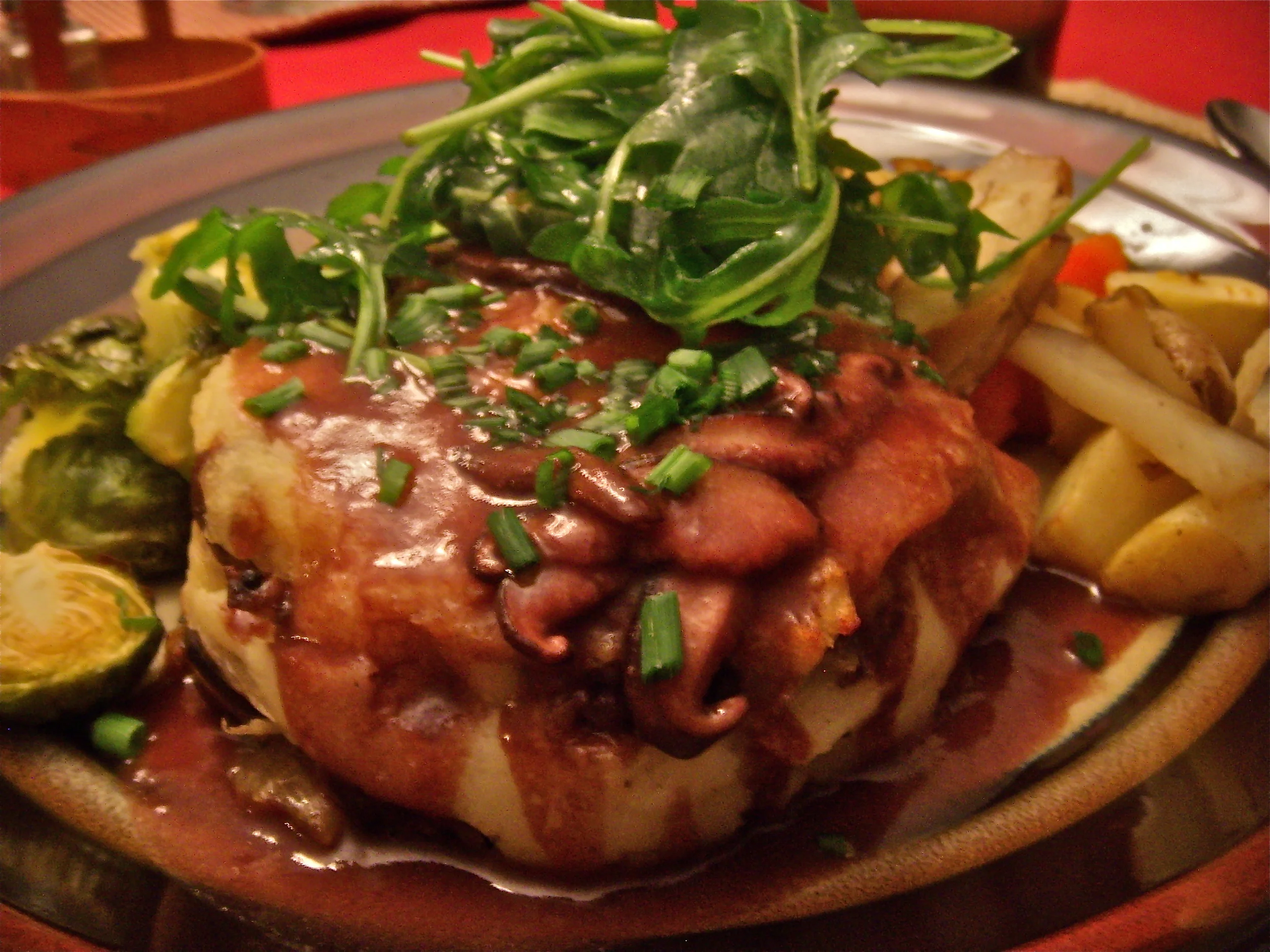   wild mushroom shepherds pie with pinot noir gravy, roasted root vegetables, maple crisped brussel sprouts  