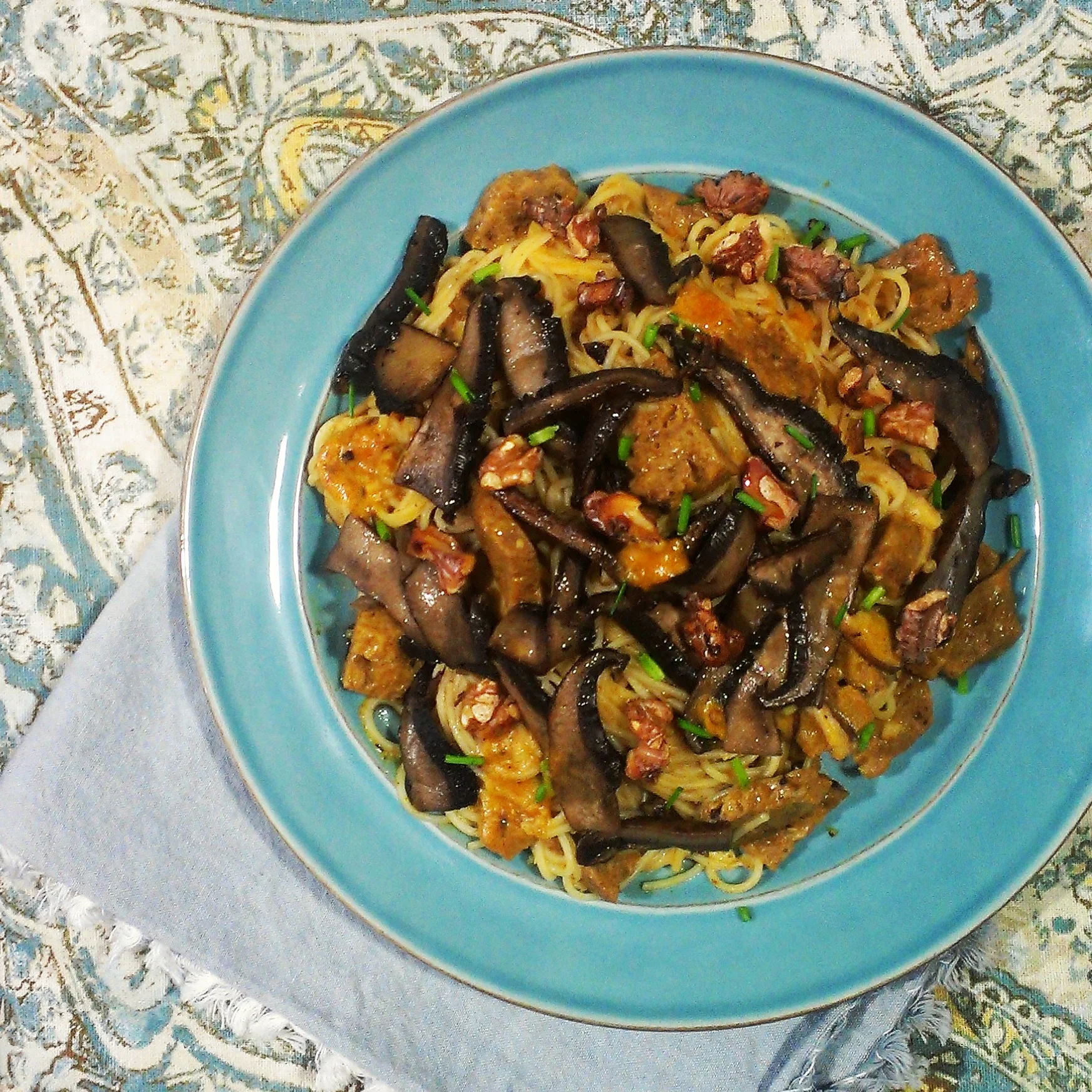 creamy triple-mushroom anglehair, toasted walnuts