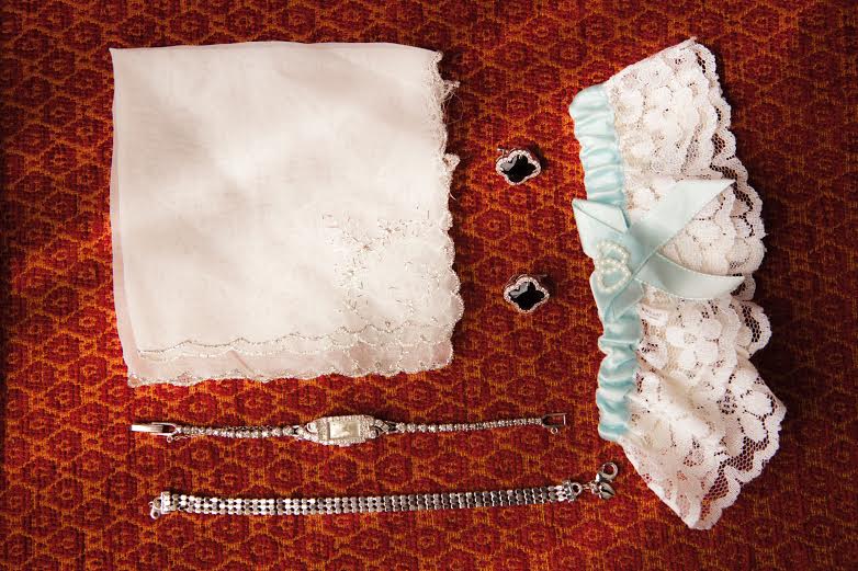 Krystyna's special touches. I'm loving vintage hankies lately! photo courtesy of Joshua Costes Photography