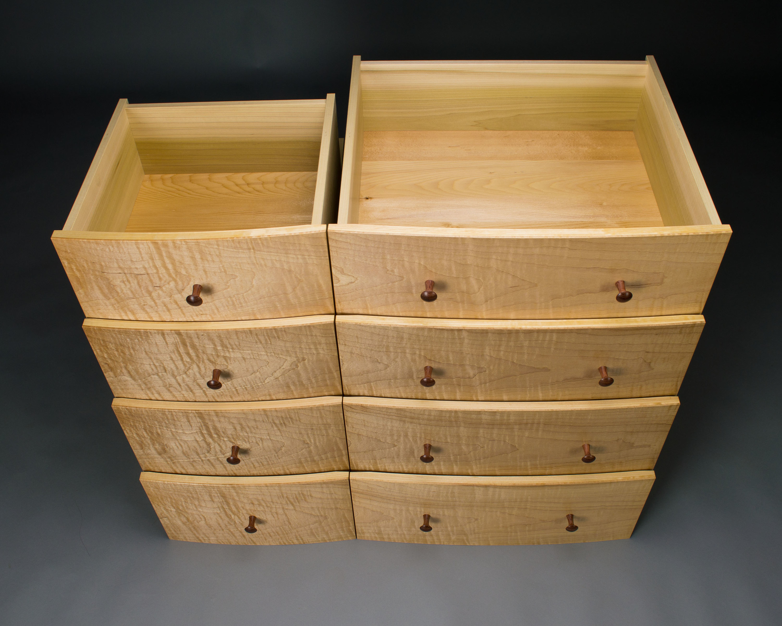  The top left drawer is shortened to make room for the hidden compartment. 