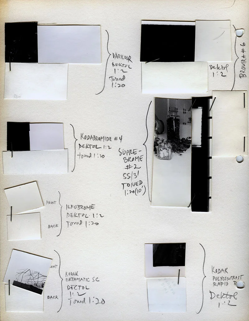 Comparing the color of seven different printing papers developed in Dektol diluted 1 to 2 and toned for a minute and 20 secs.