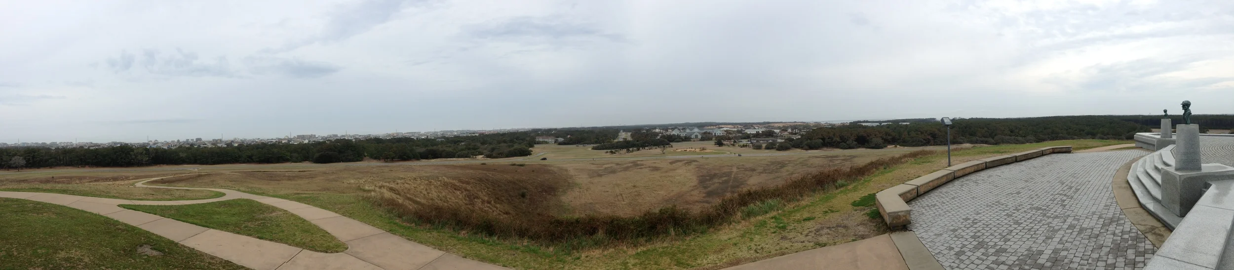 It makes sense, that these brothers were driven to invent flight when you stand atop the dunes that they made history on. You can turn completely around and see the town and ocean from where you stand, and you simply want to coast around and soak in…