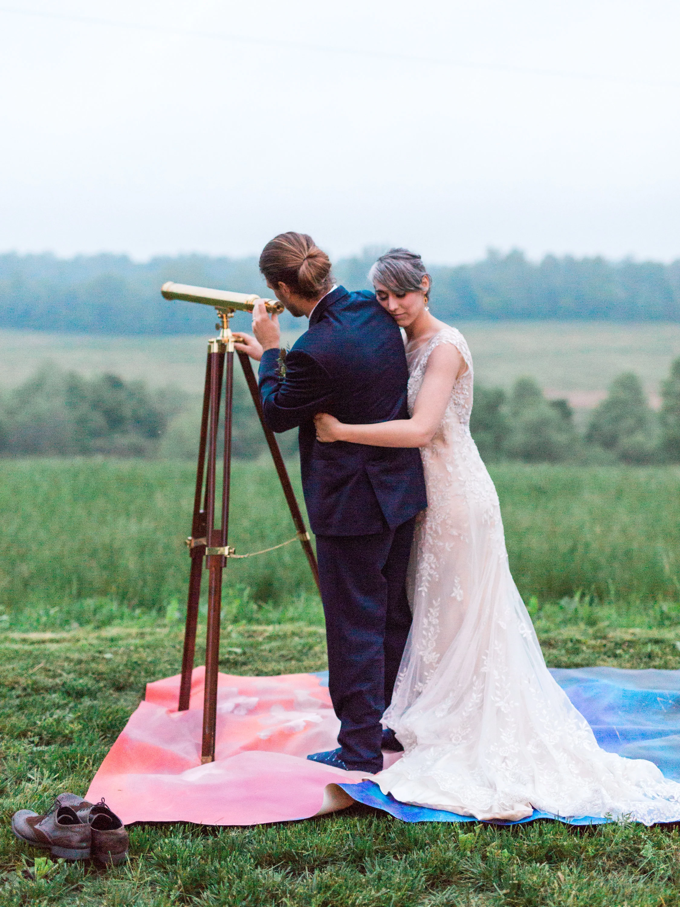 Bride and Groom with telescope