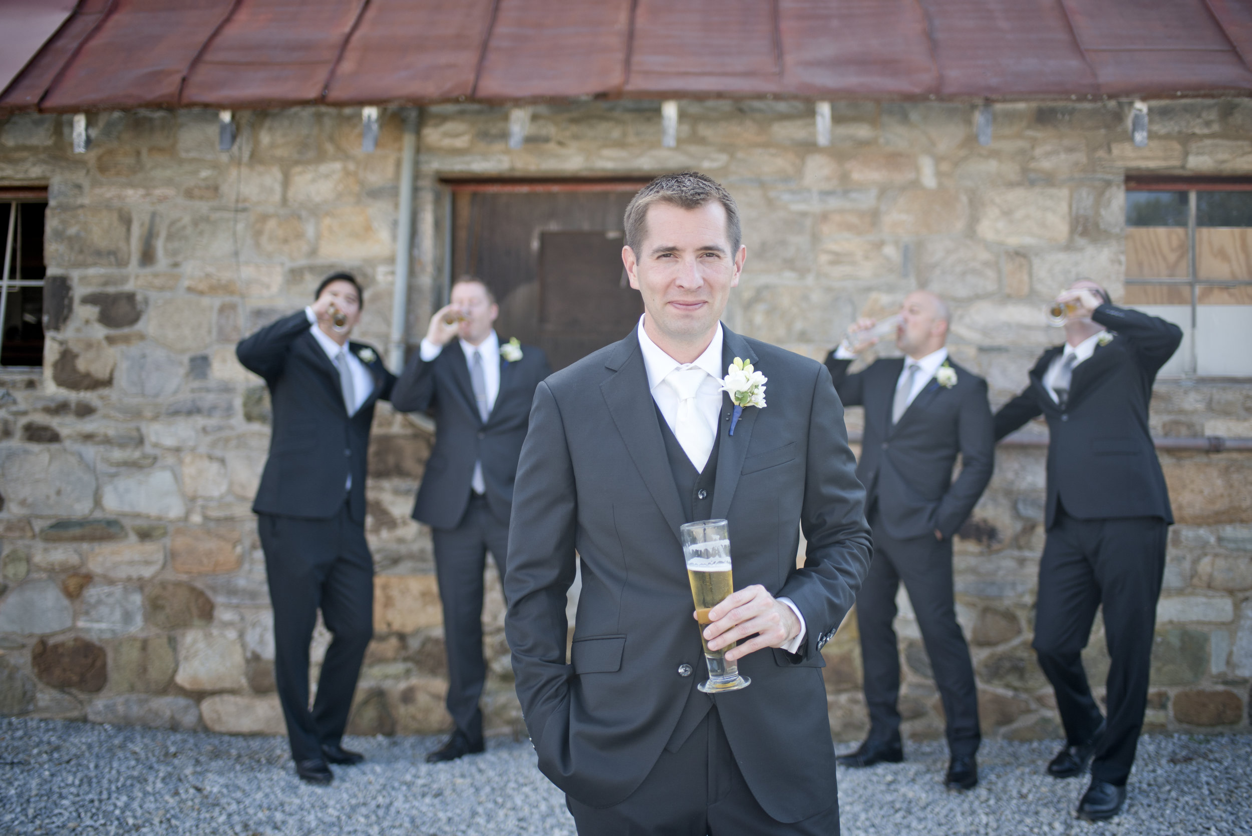 Groomsmen with white boutonnieres