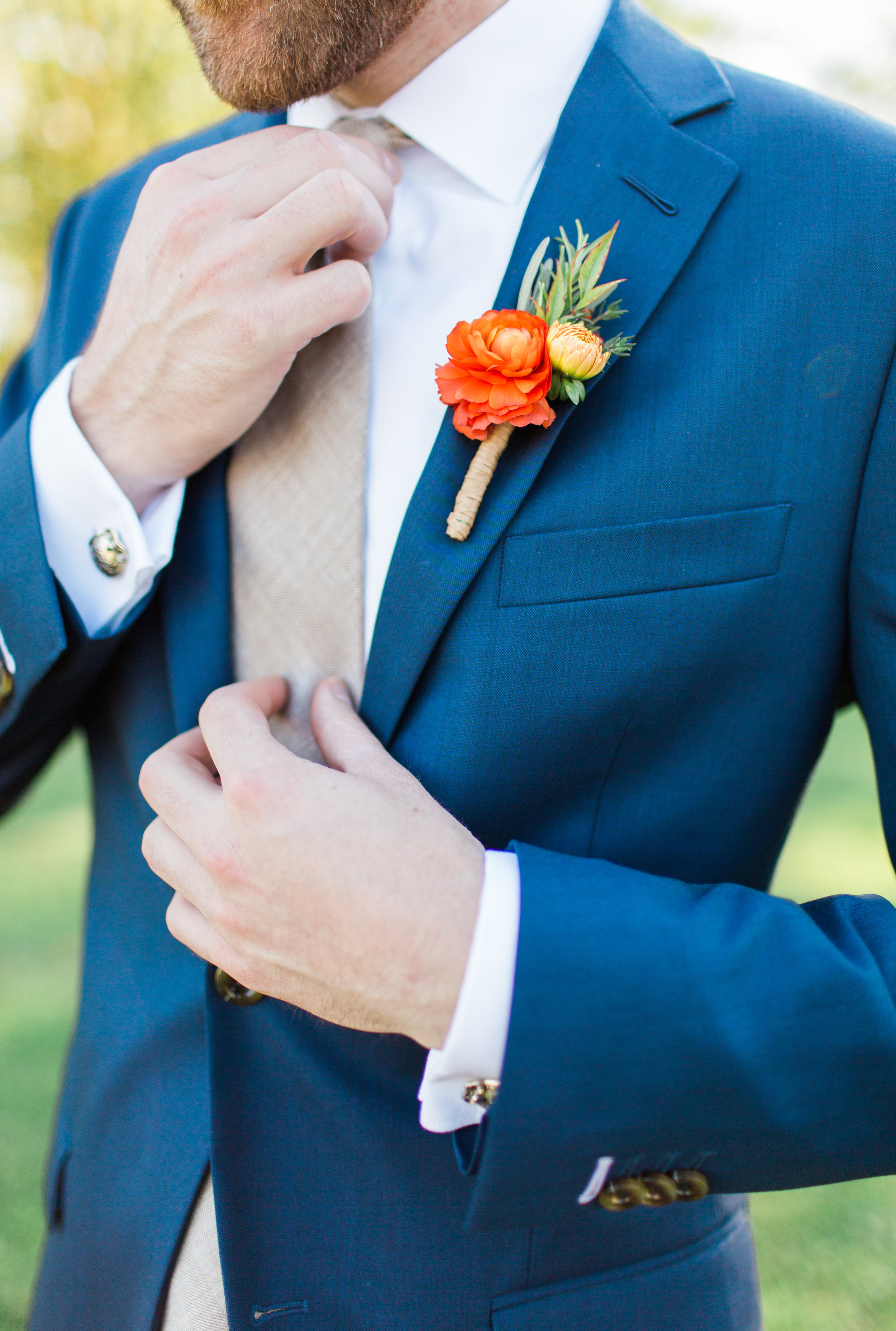 Orange Ranunculus Boutonniere