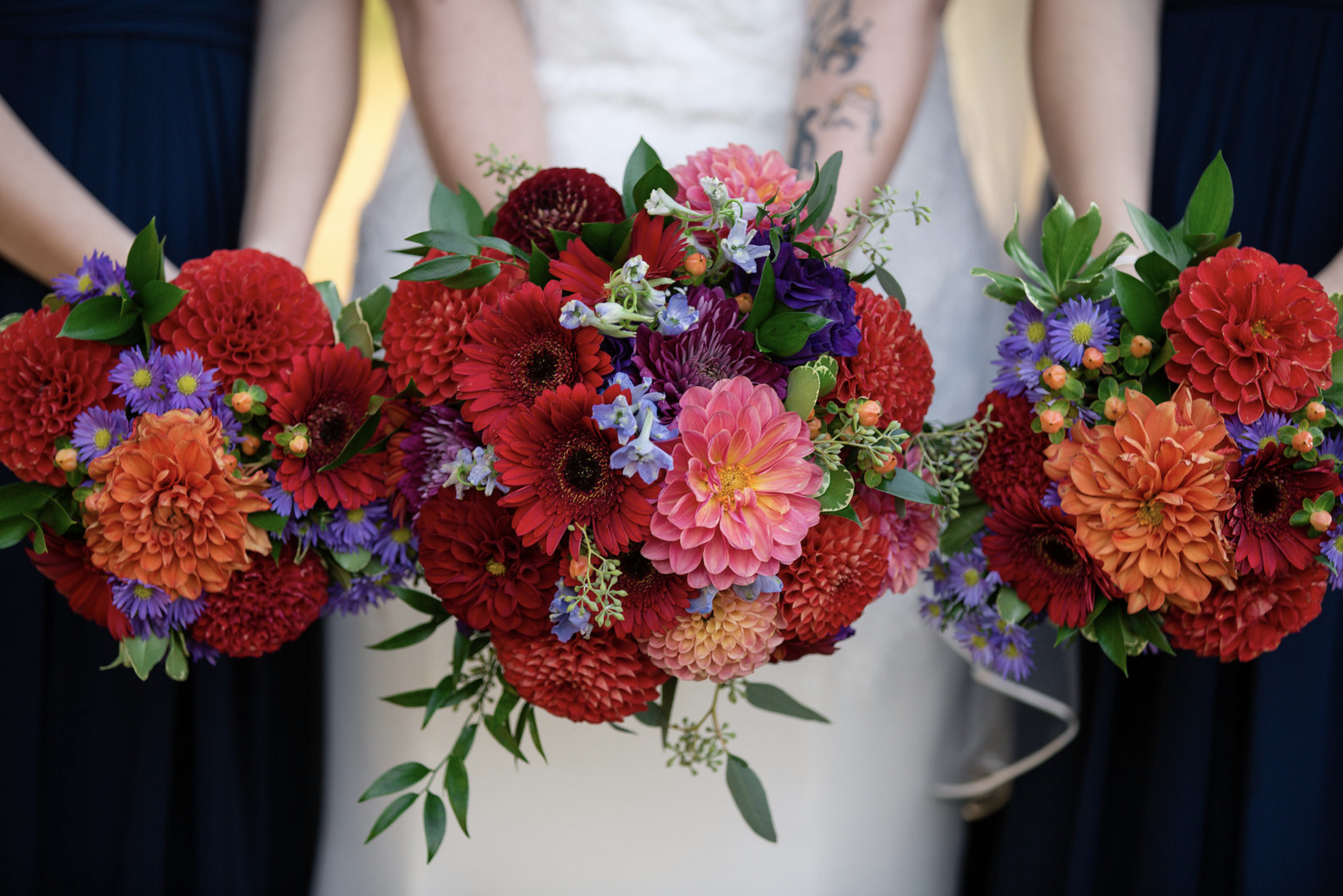 Bridemaids bouquets of dahlia and gerbera daisy