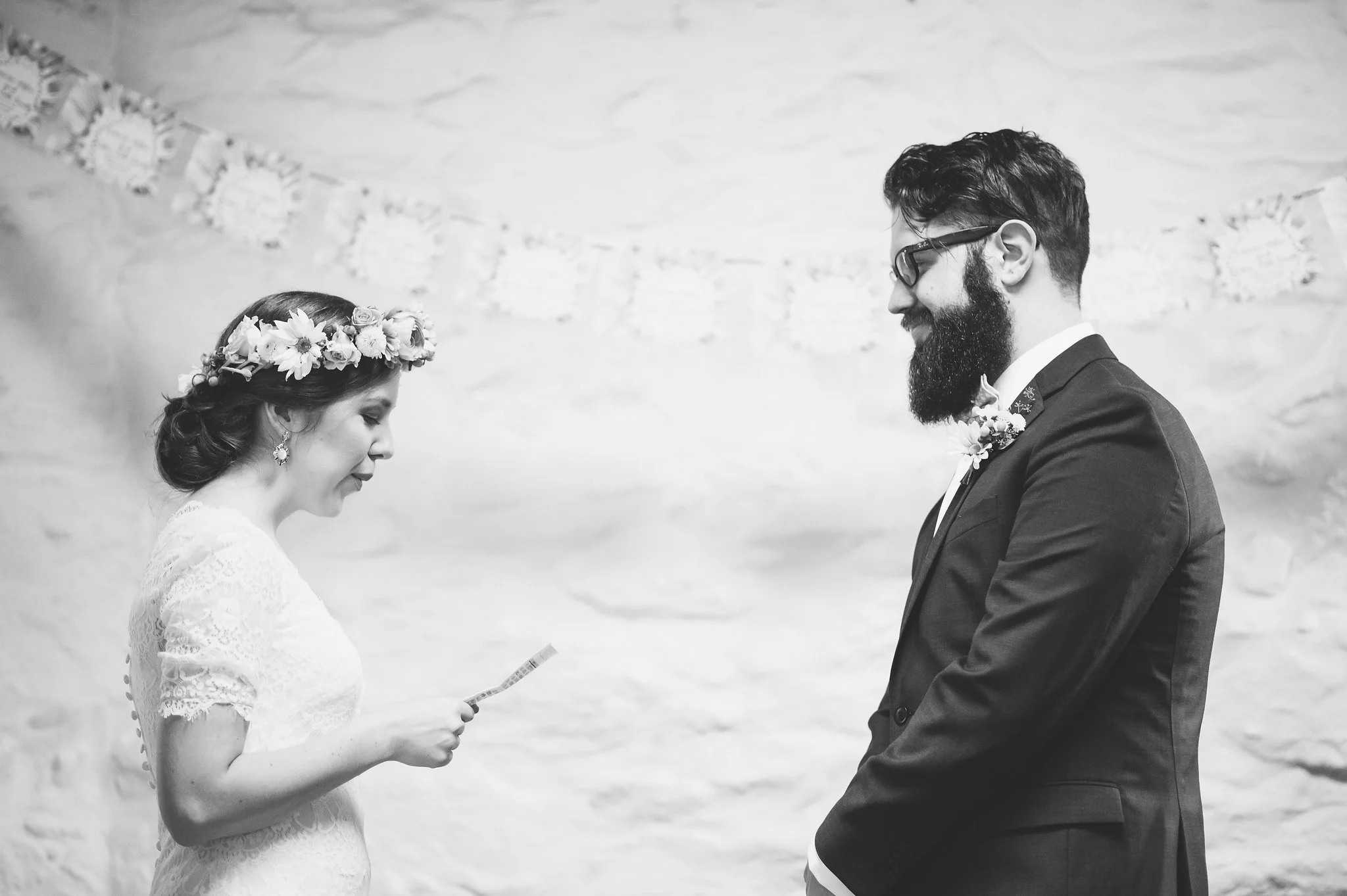 Bride and Groom read vows