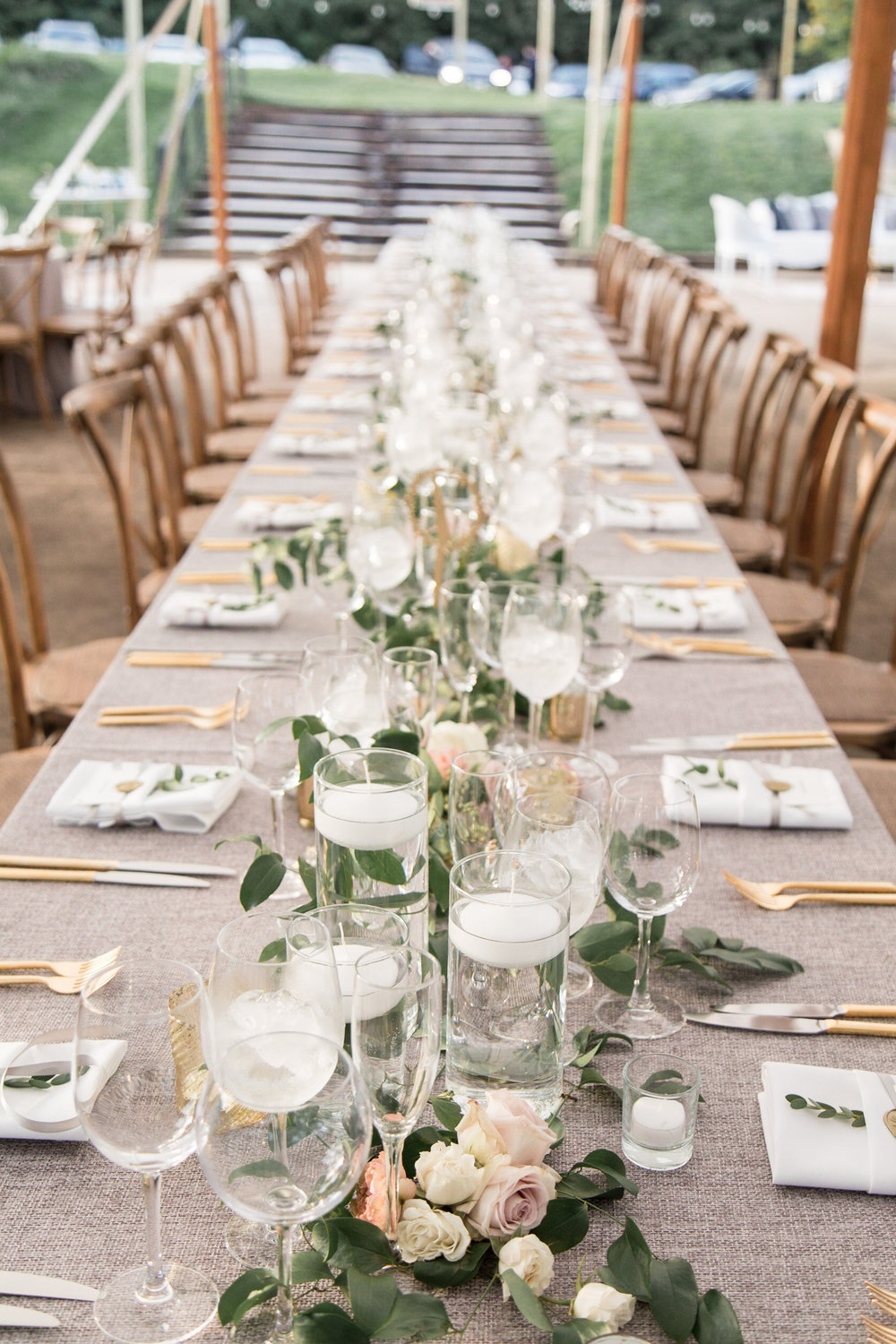 Long table with garland centerpiece at Tranquility Farm