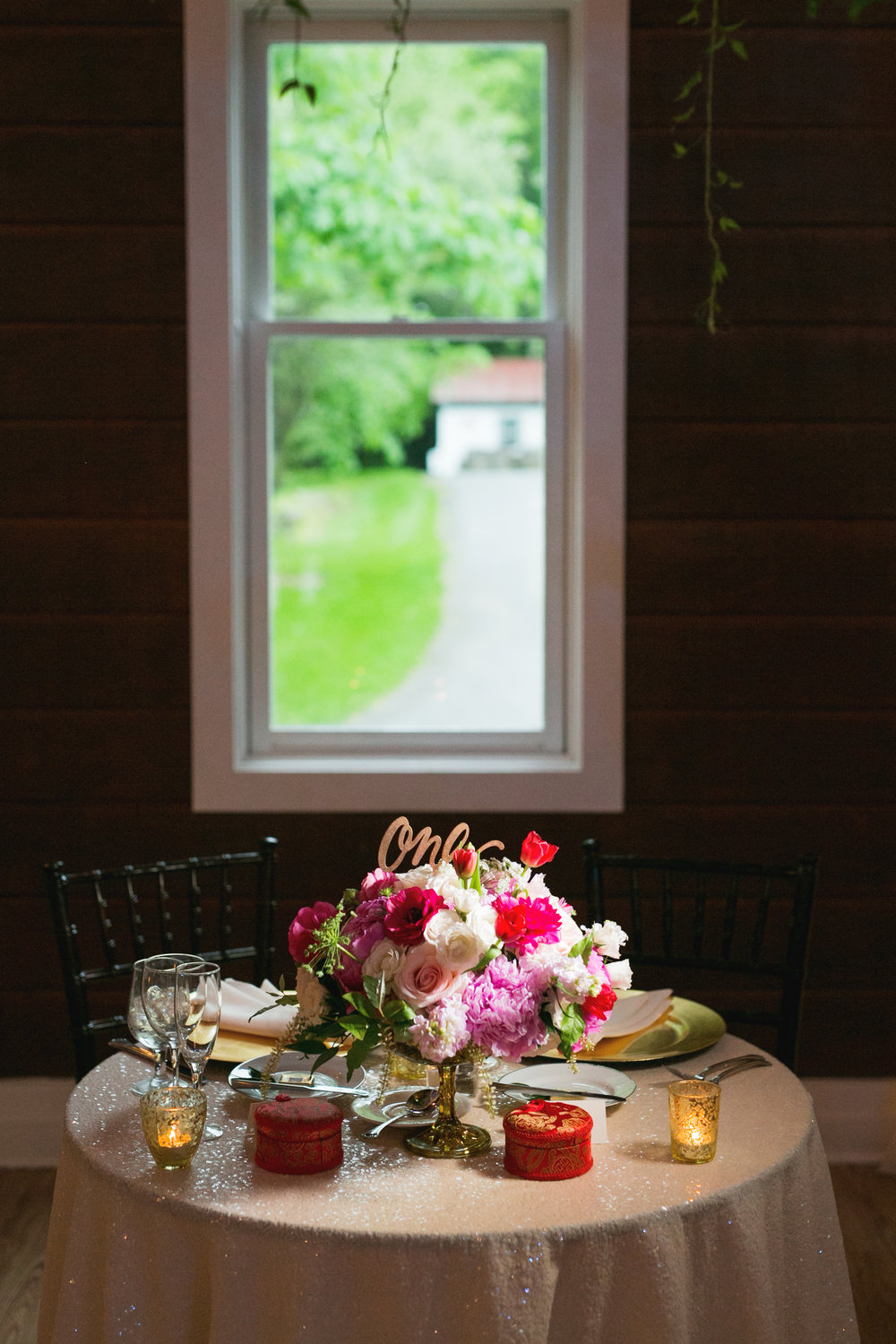 Pink and red wedding flower centerpiece