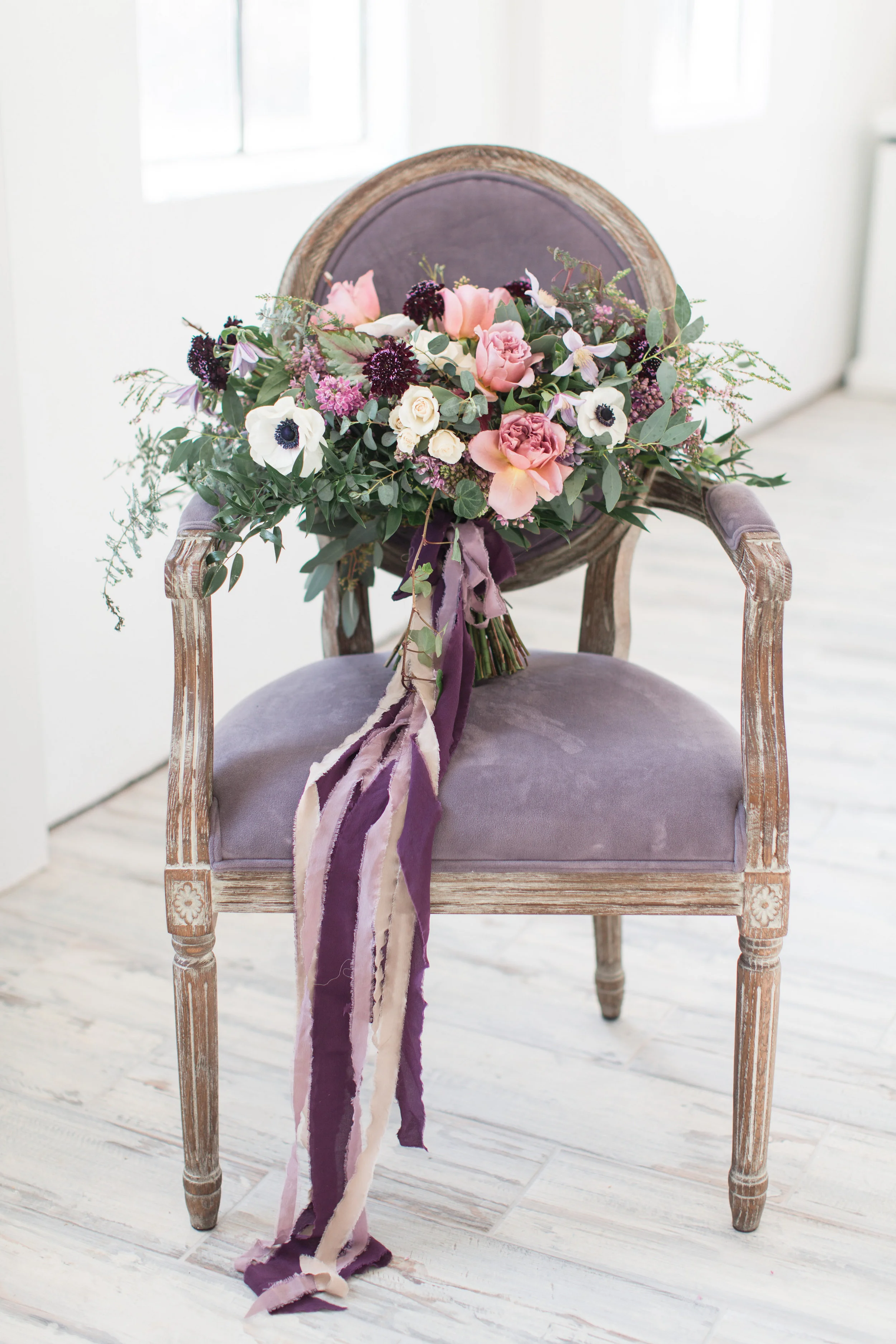 Bridal bouquet of purple and blush pink flowers with silk ribbon by Lark Floral Loudoun County wedding.