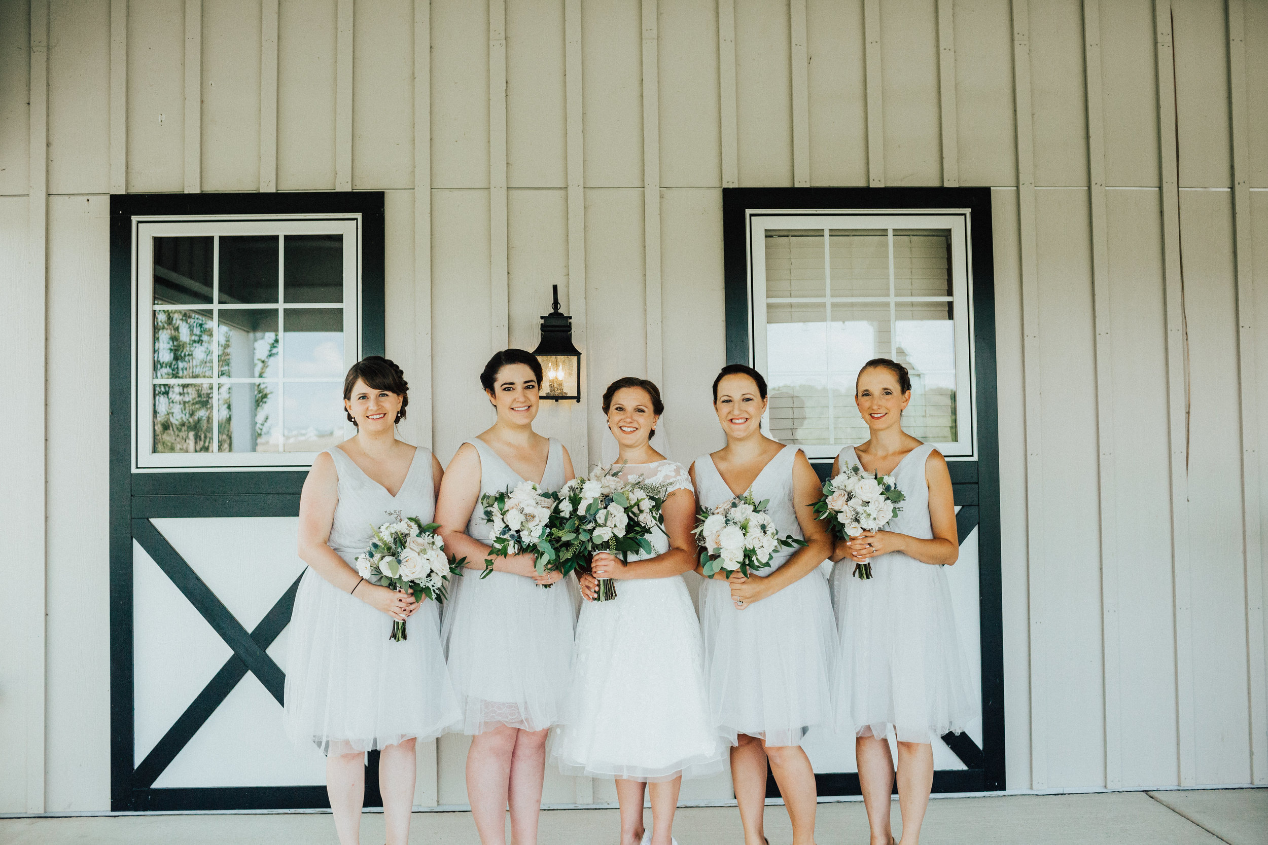 Bride and Bridesmaids with bouquets