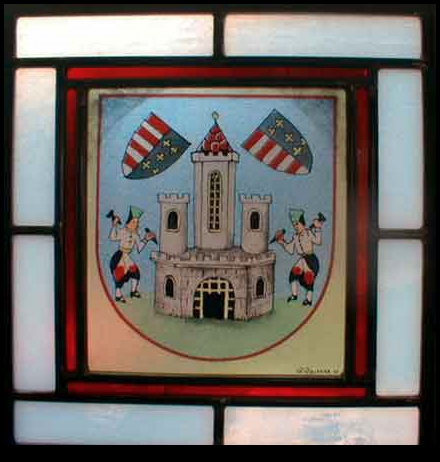 This crest is entirely hand painted on a red flashed glass that has had most of the red etched off.