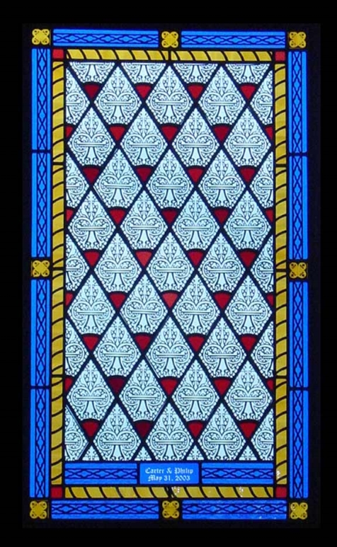 This window is created mostly by silk screening. It was inspired by the church where the couple was married. By taking pictures of the windows, I could recreate the same look and feeling of that memorable moment in a personal gift.