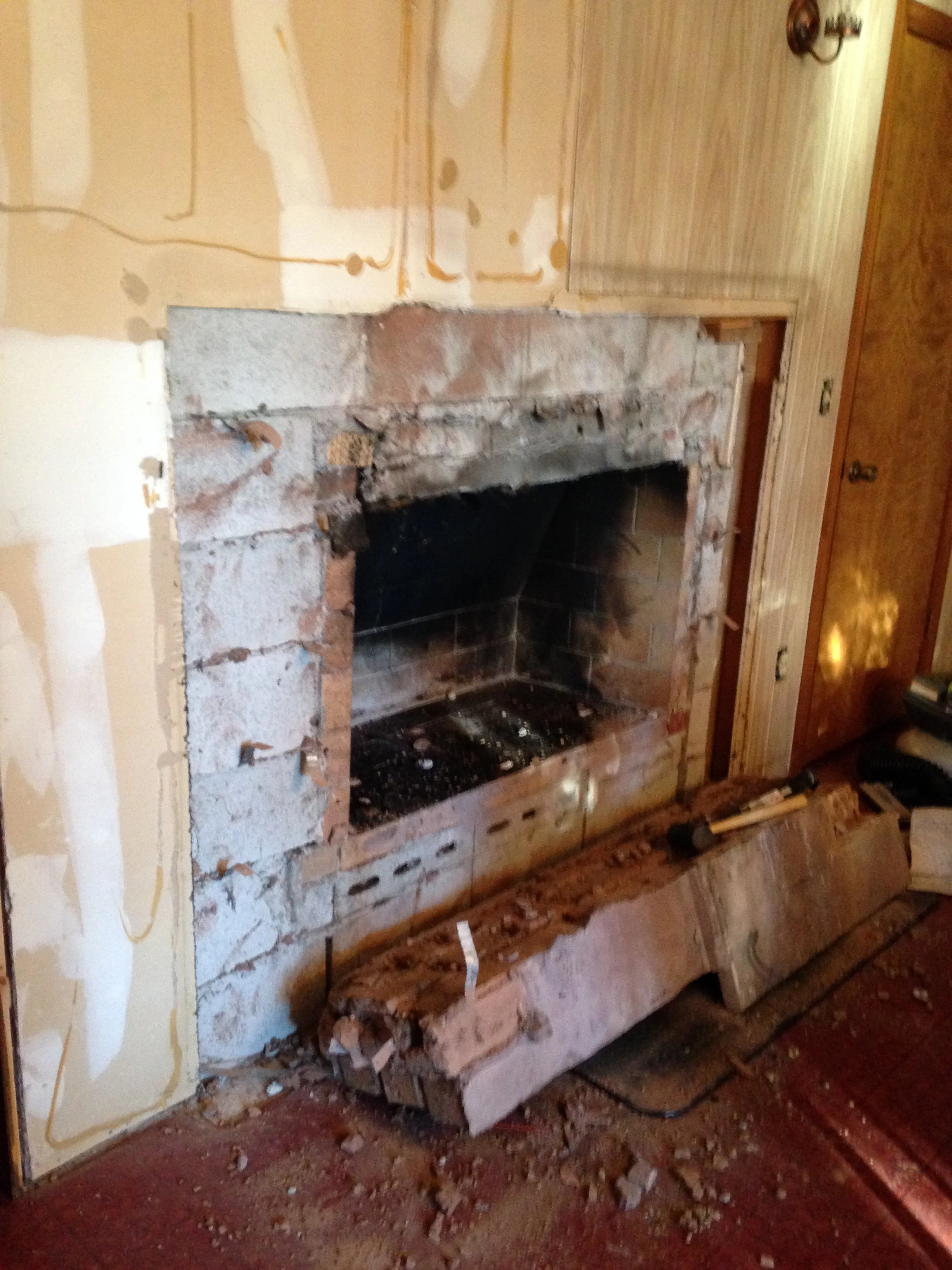 BEFORE: Dining room fireplace so old it nearly fell down looking at it. 
