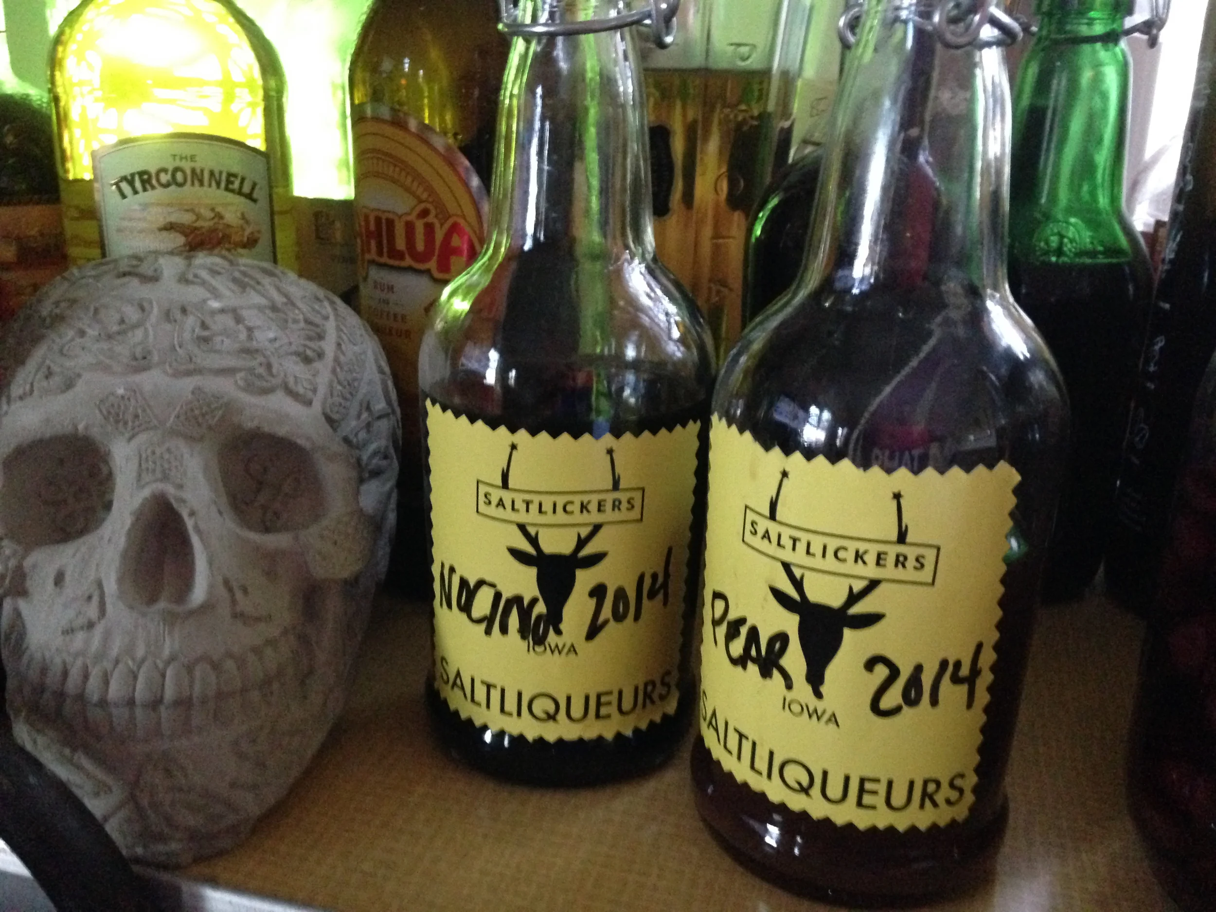 Home made noçino and pear liqueur