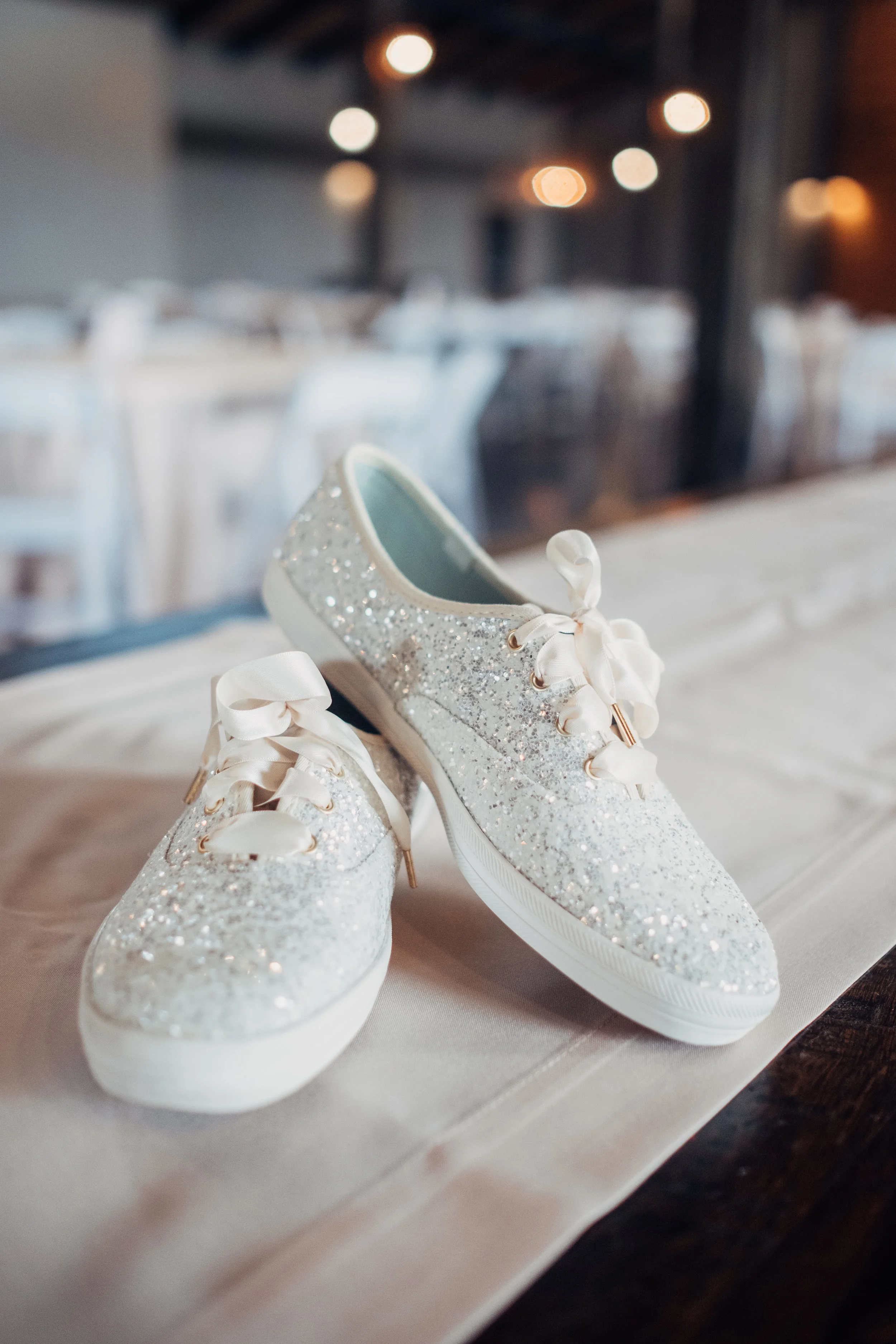 Jessica rocked her shoe game with some Kate Spade glitter Keds. 