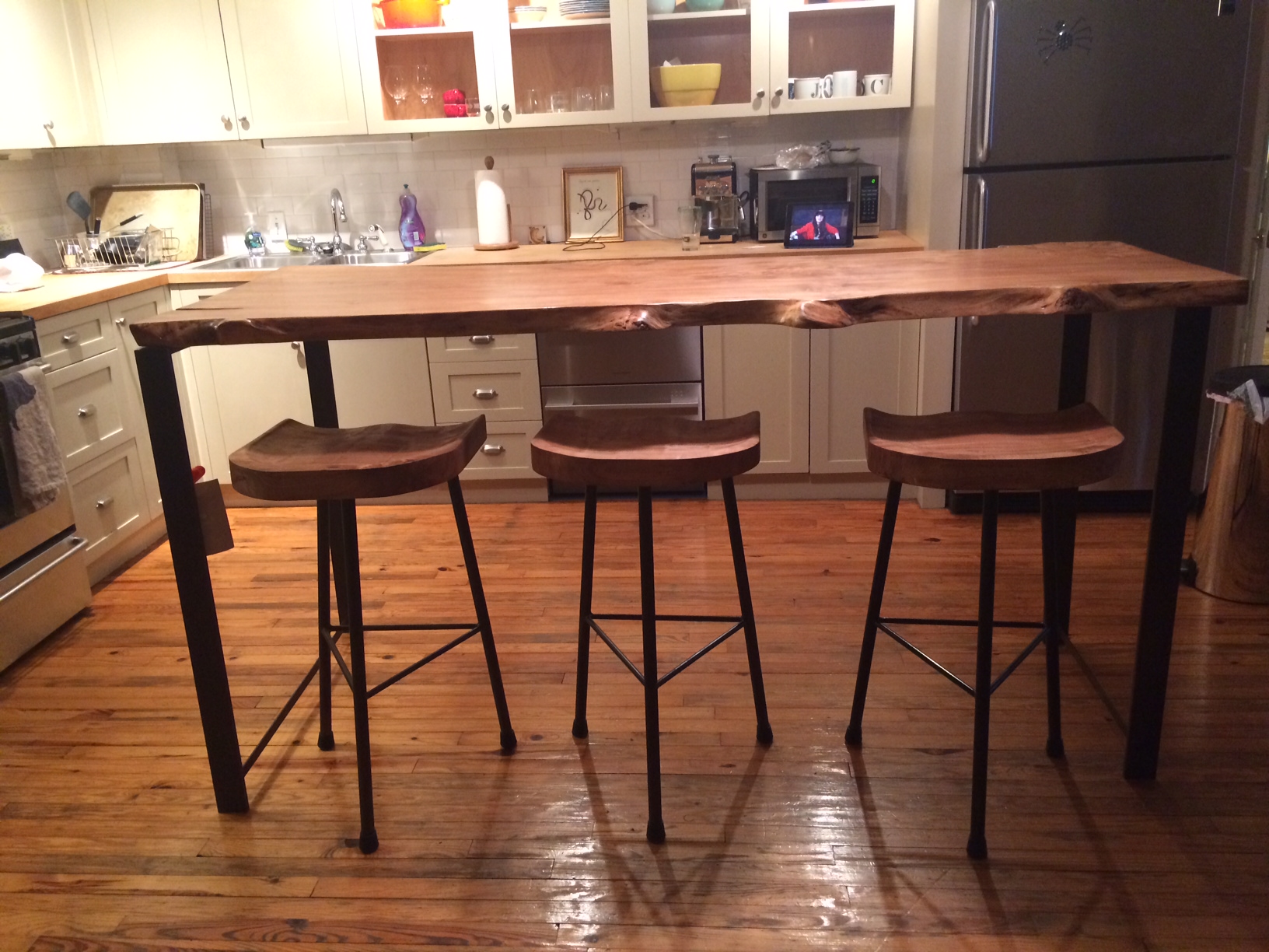 Maple Table and Vintage Tractor Seat Stools