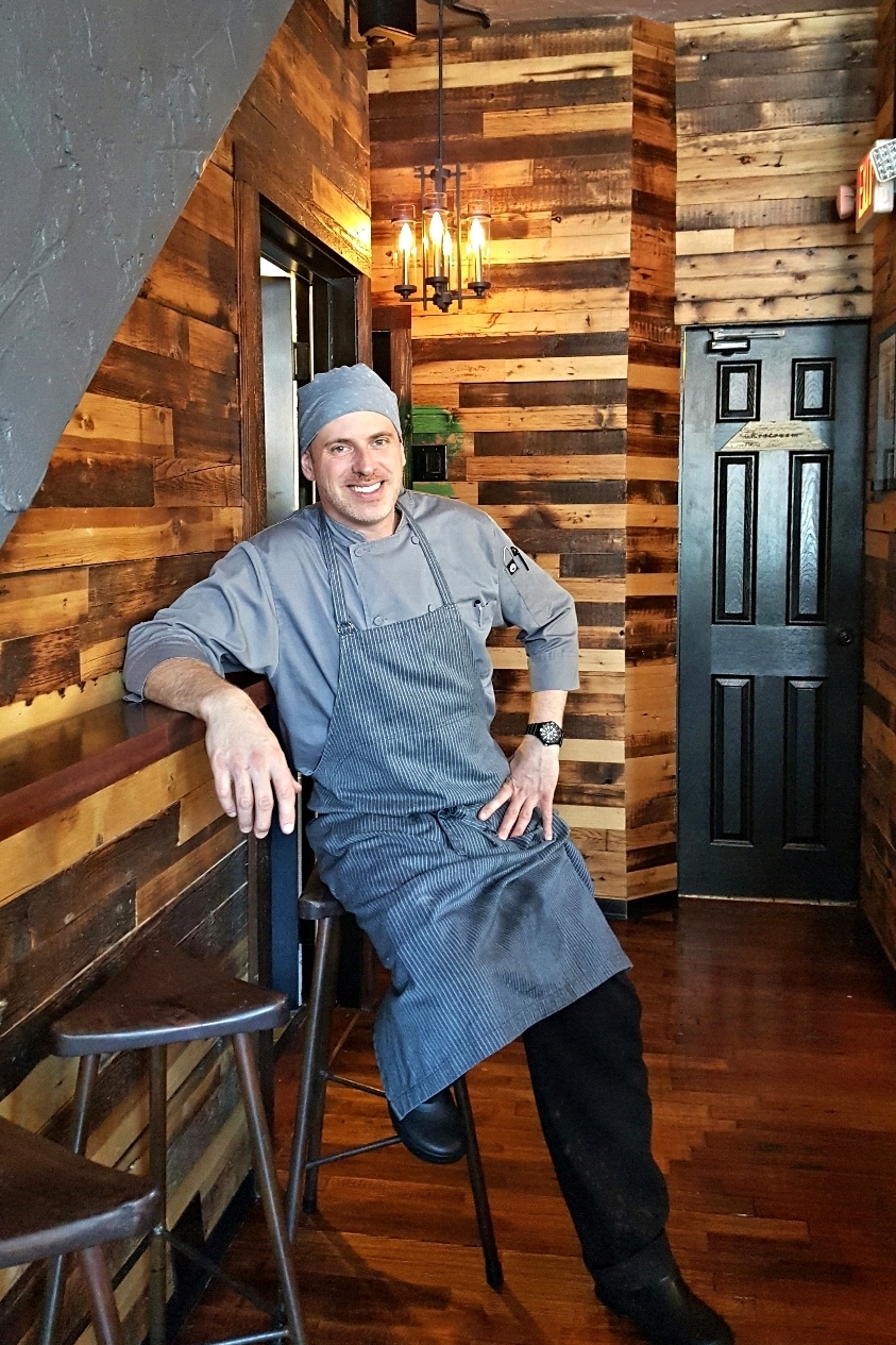 NYCS provided the wood used in their new bar space - reclaimed wood for walls, bar and ceiling beams. We also made the triangle stools shown in the picture. 