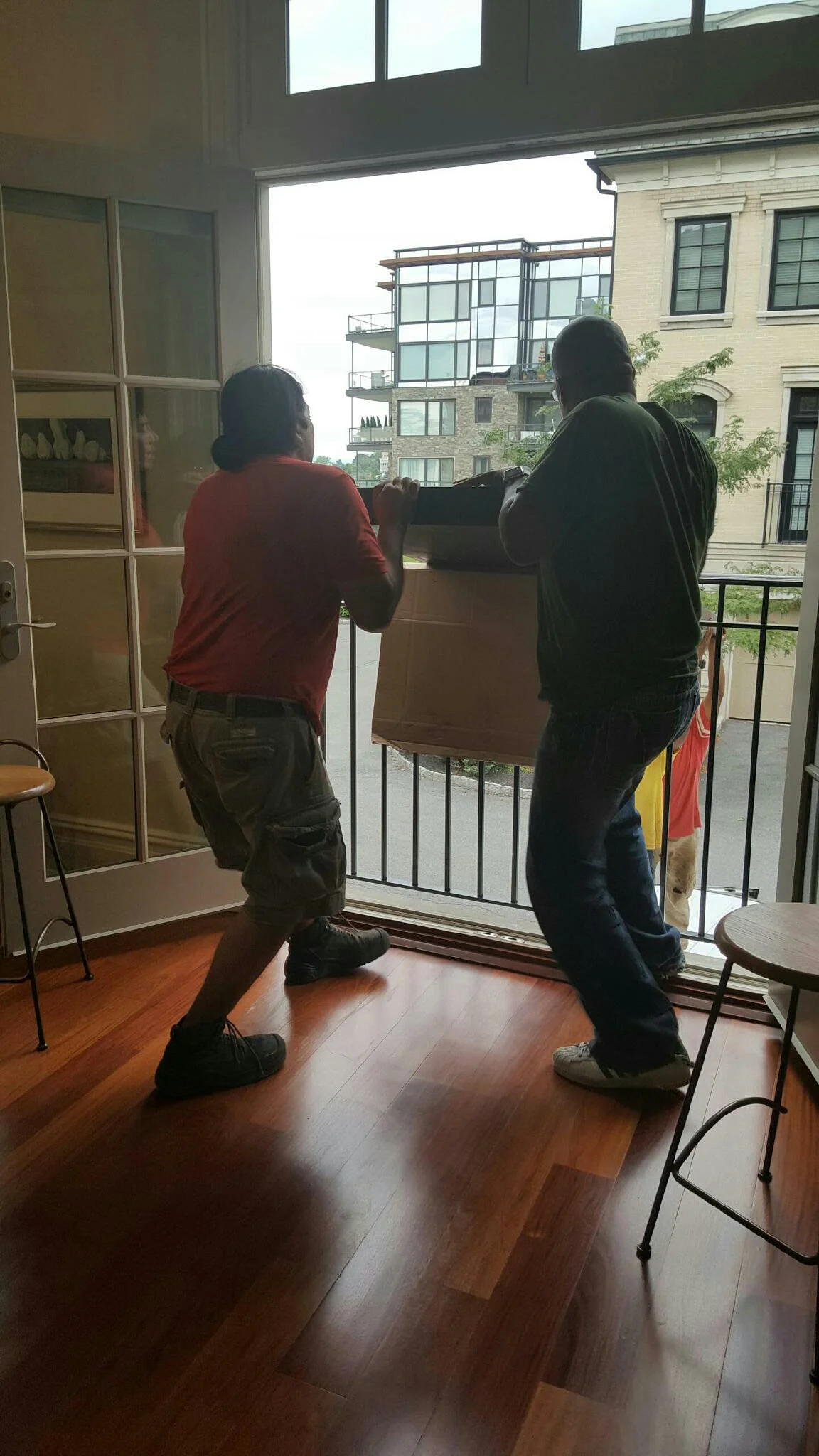 It took our whole crew and then some, to get the banquette indoors.