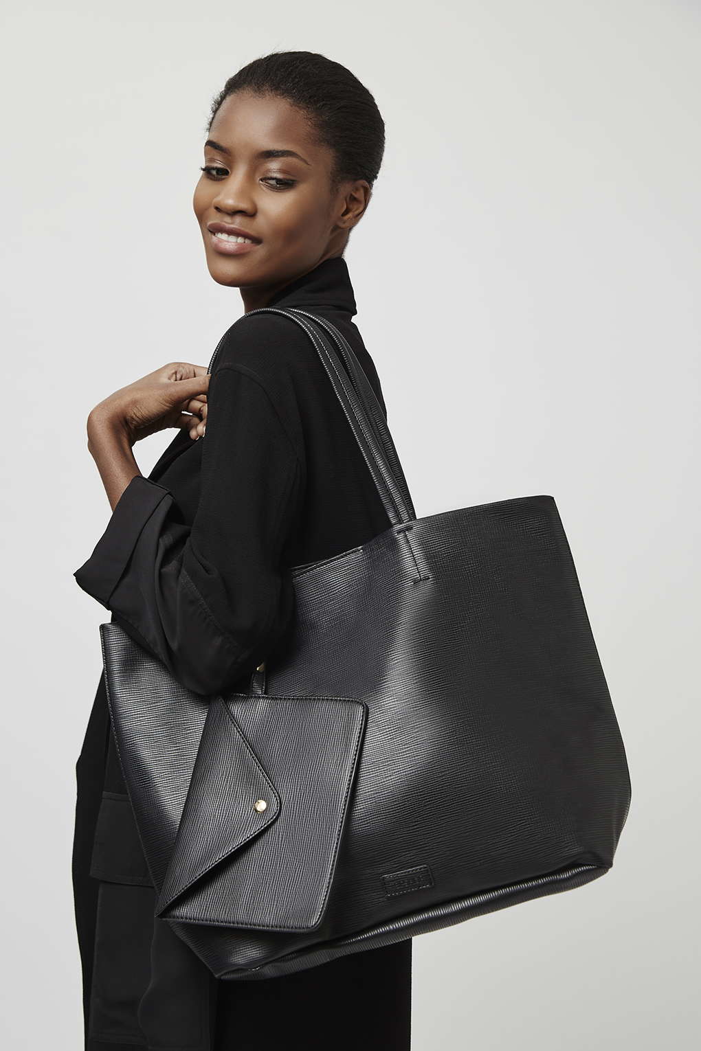 This bag will solve all of my computing-my-work-laptop-to-and-from-the-office problems and still compliment my outfits.