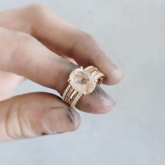 These stacked wedding bands and ring by Natalie Marie Jewelry will be my new wedding set--once I convince the husband