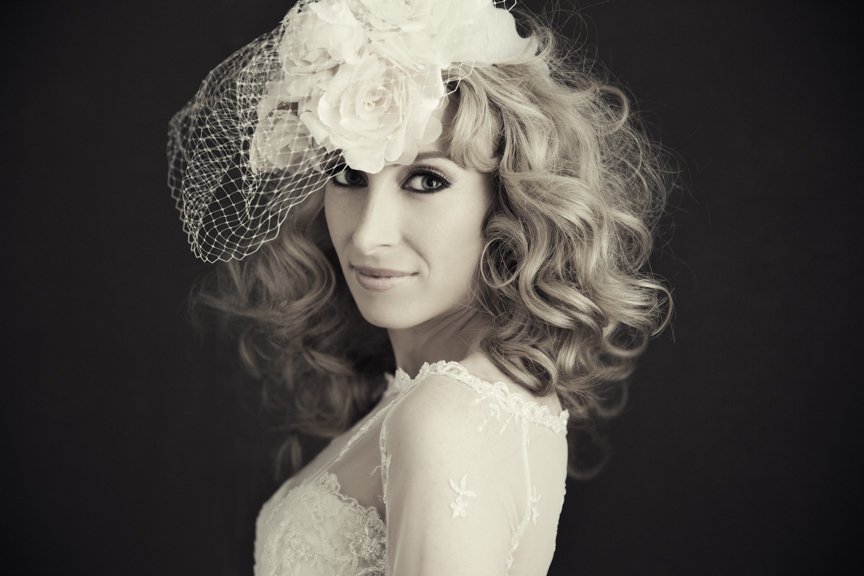 bridal hair out with birdcage veil