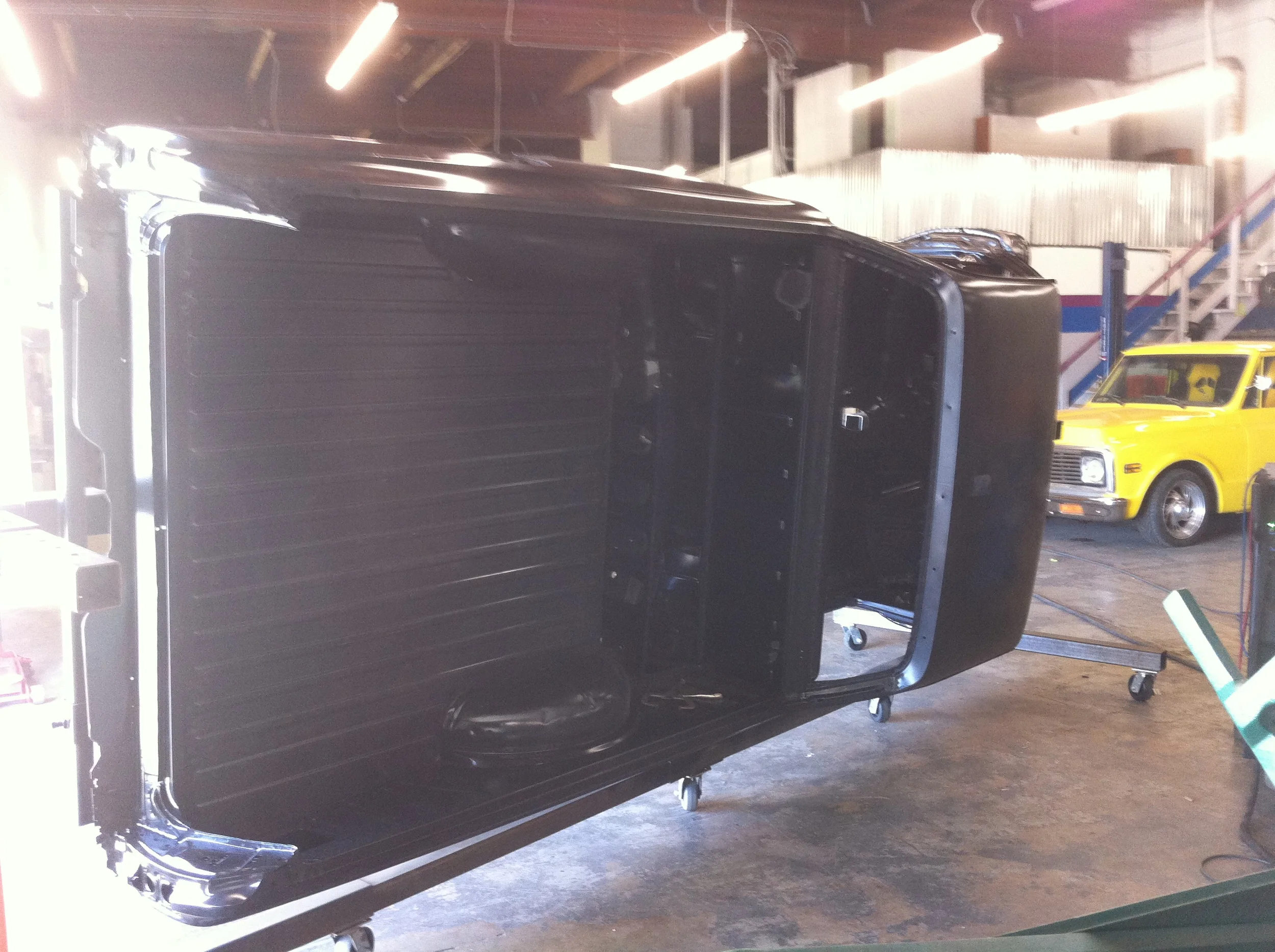  Rust is repaired before moving on to hammering out all of the dents. Then the body can be sent to the paint shop. 