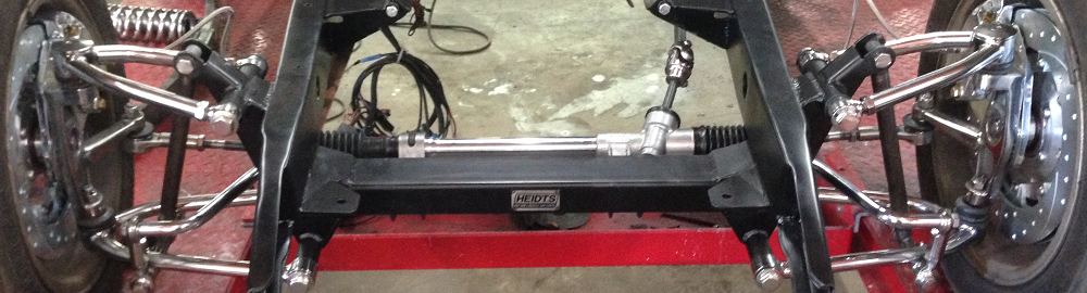 1934 Ford Sedan: Mustang II installation, convert rear C4 suspension from mono leaf to coilover