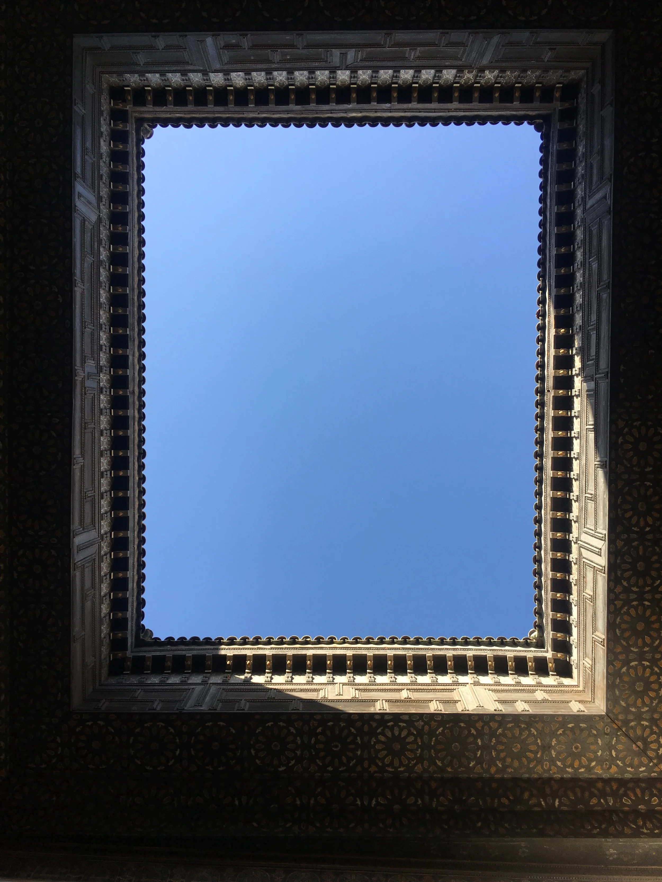 Look up at this open air courtyard at Riad de Tarabel.