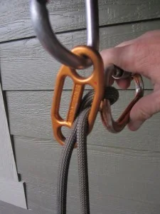 As you rotate the biner, you’re essentially taking the climber’s (or load) strand and flipping it to the bottom. Because of the wider slots on the GiGi, with a rope of less than 10mm in diameter, it is possible to flip the climber’s strand to the bottom and the GiGi is no longer in belay mode and will fail.