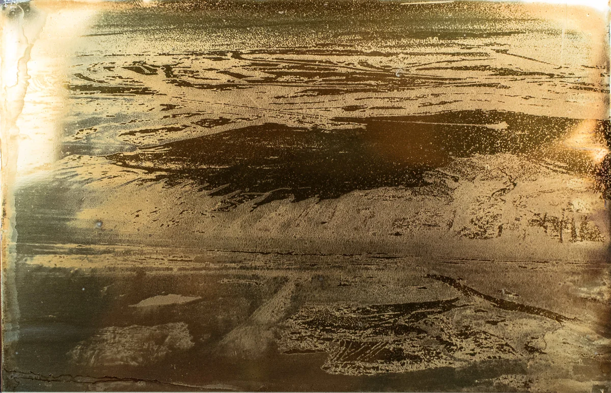Taillings Pond with Strip Mines in Distance.