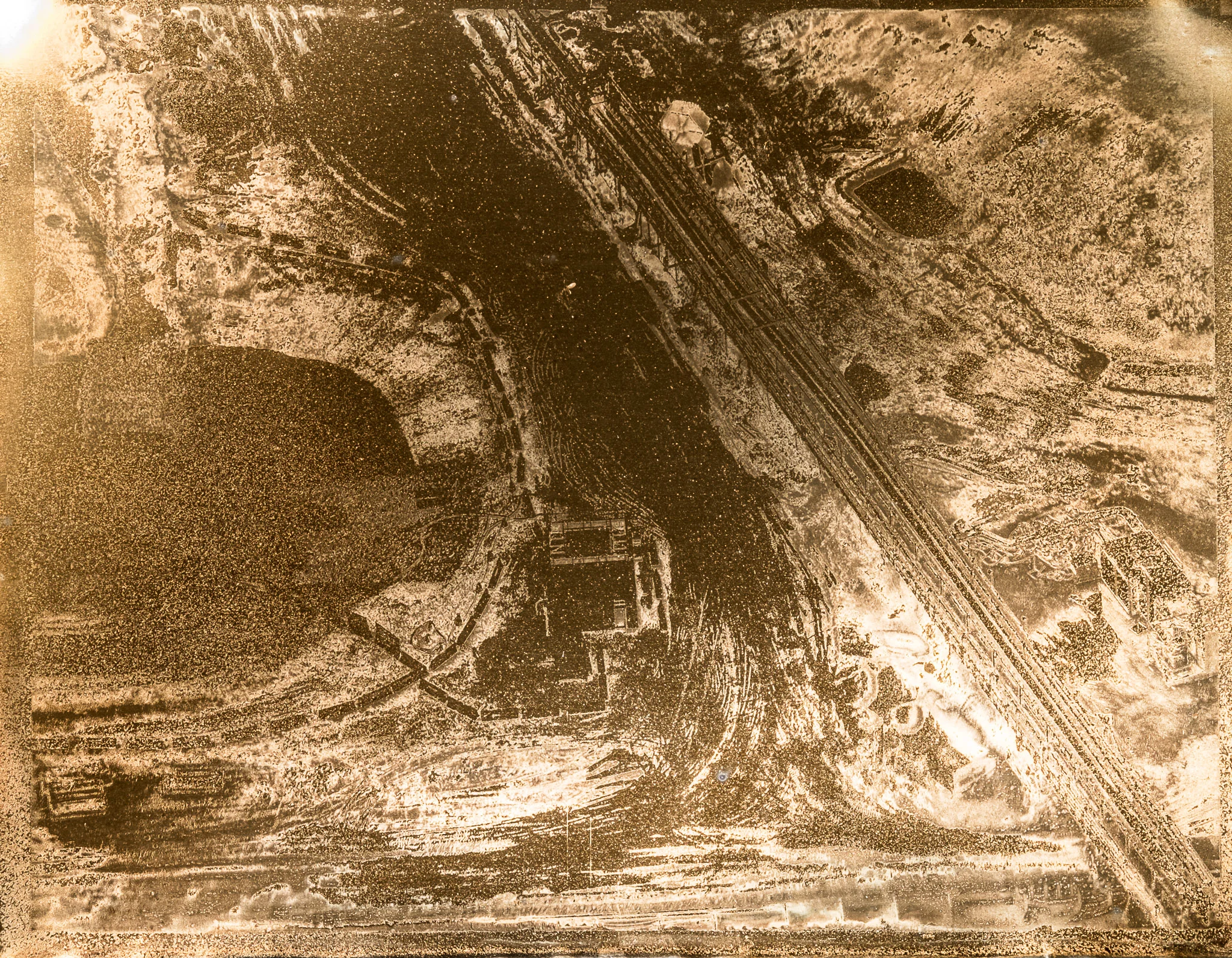 Open Earth with Pipeline (strong lighting). Note insect embedded in surface, upper centre.